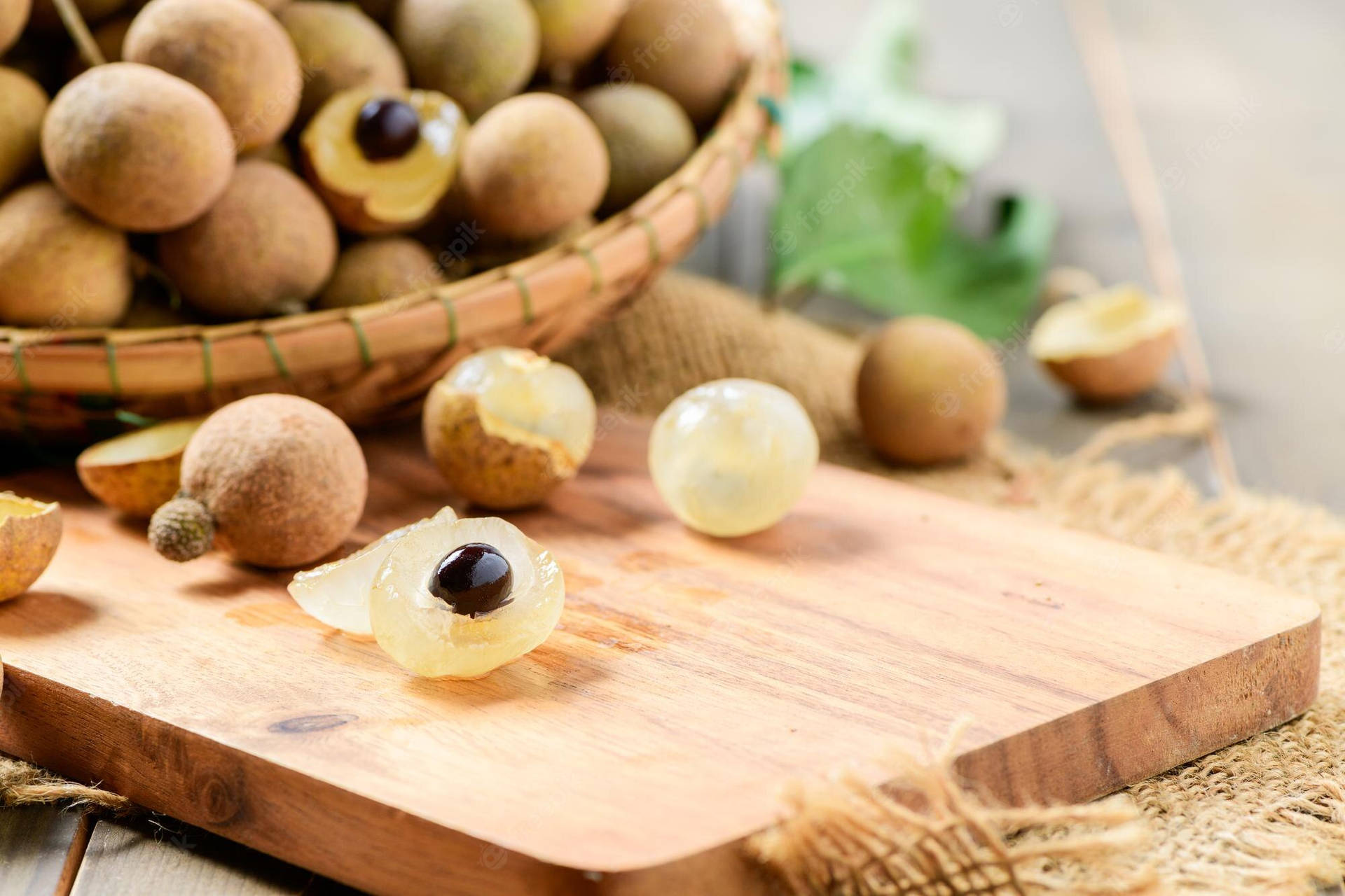 Fresh Longan Fruits On Chopping Board