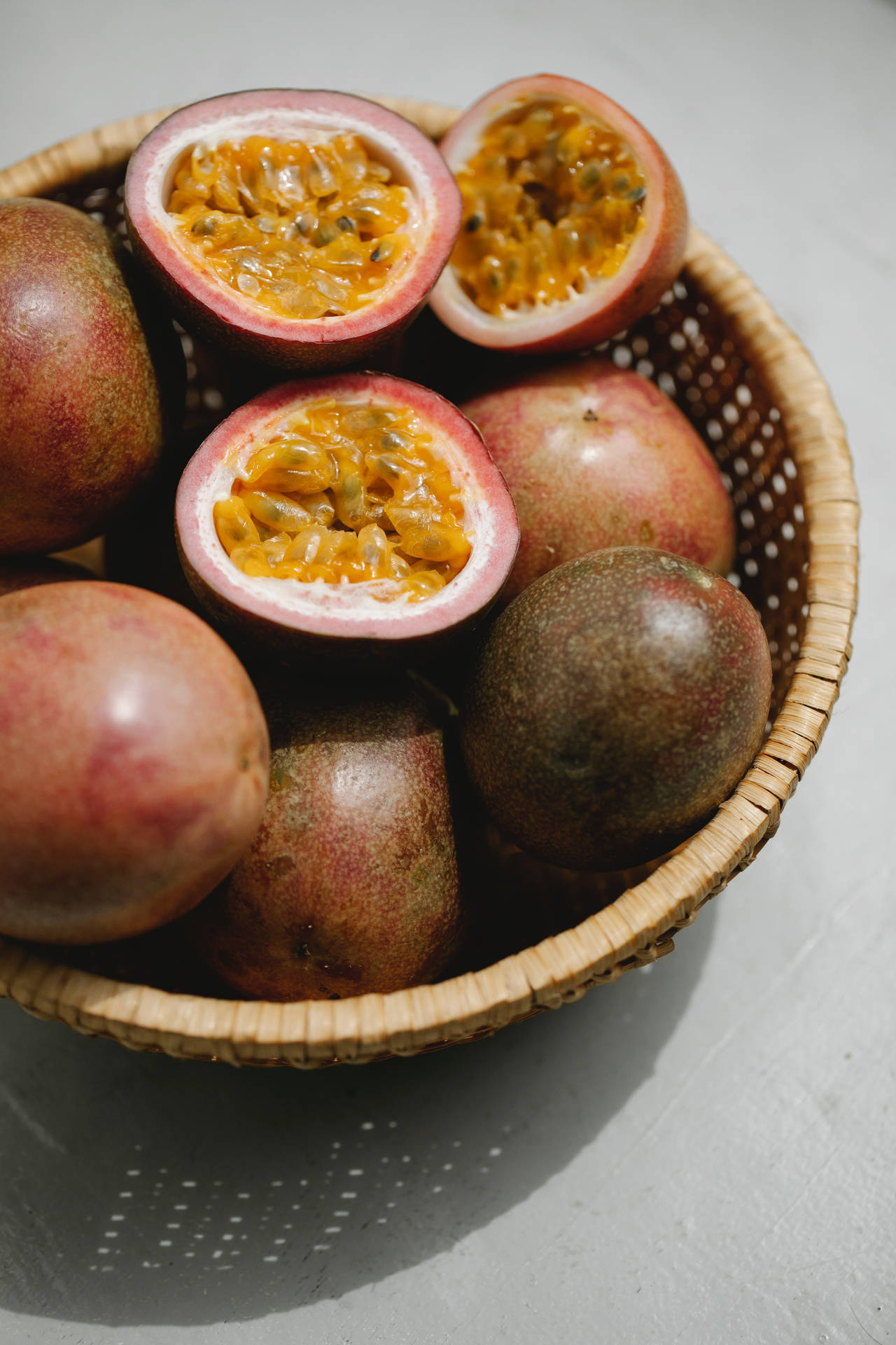 Fresh Passion Fruit In Wicker Bowl Background