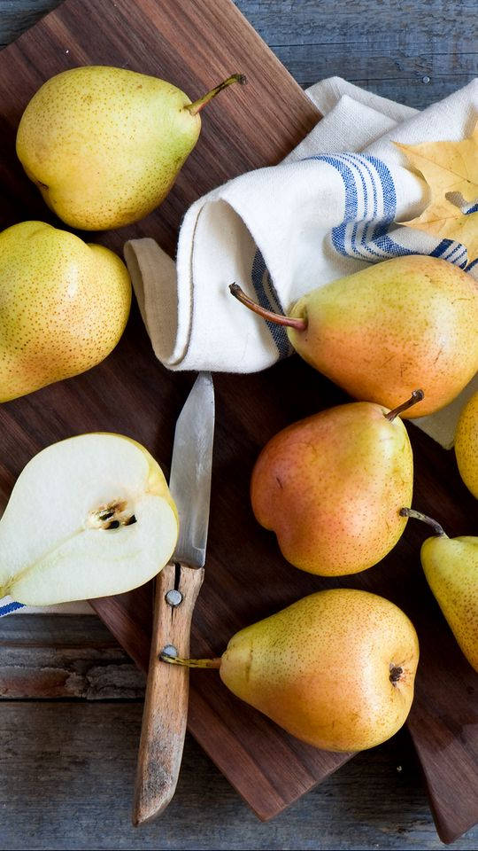 Fresh Pears On A Wooden Chopping Board