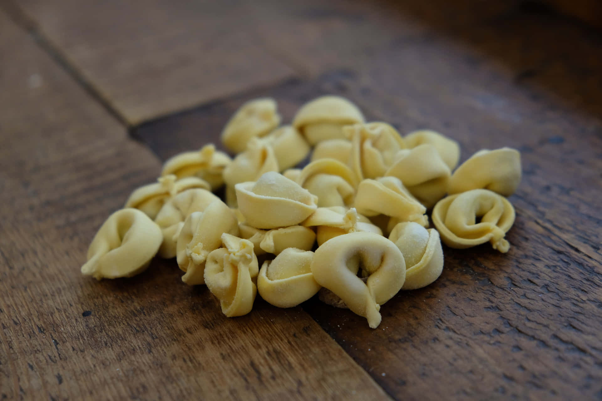 Fresh Raw Pasta Ingredients For Making Tortellini In Brodo Background