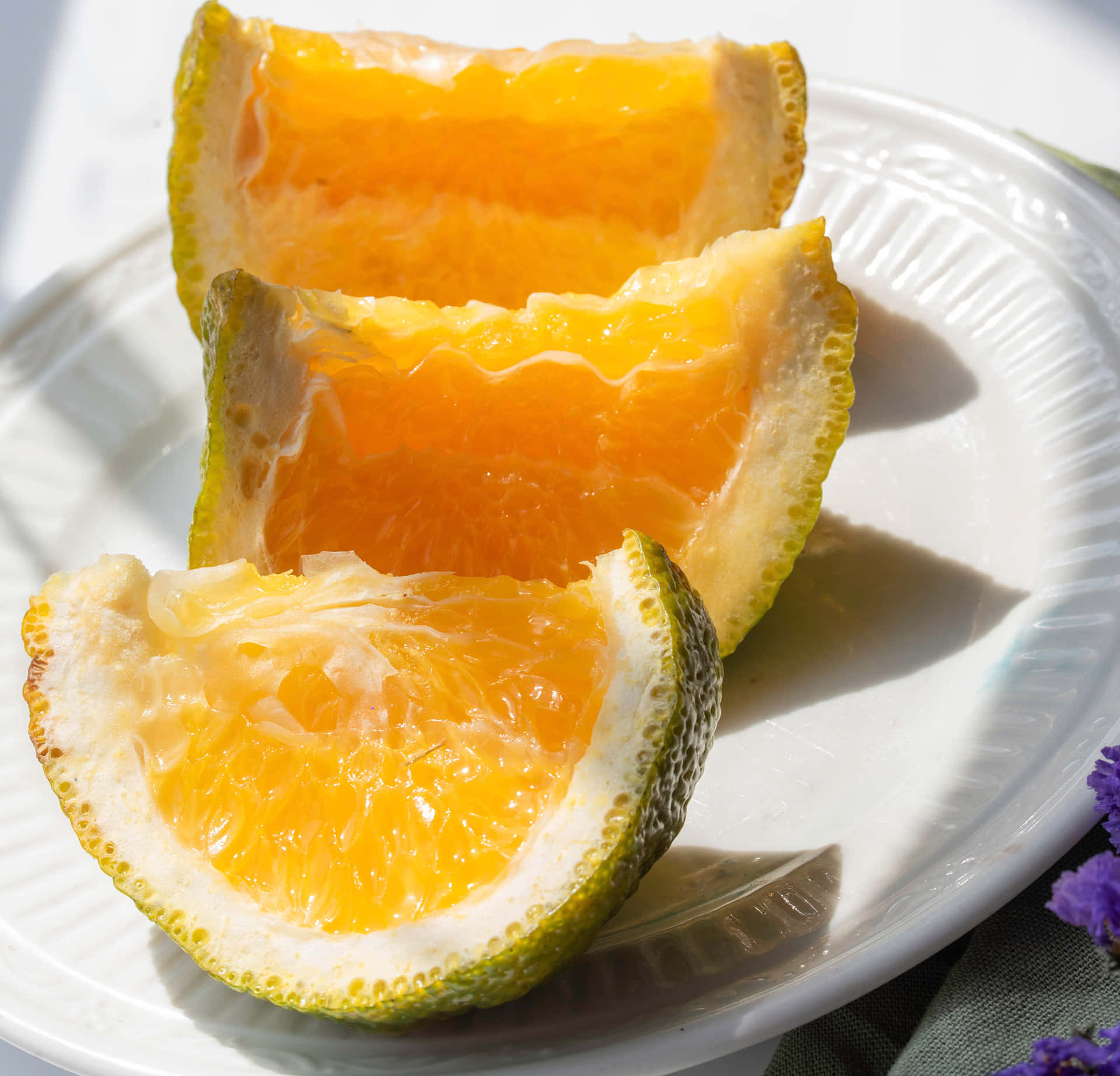 Freshly Cut Ugli Citrus Fruits Background