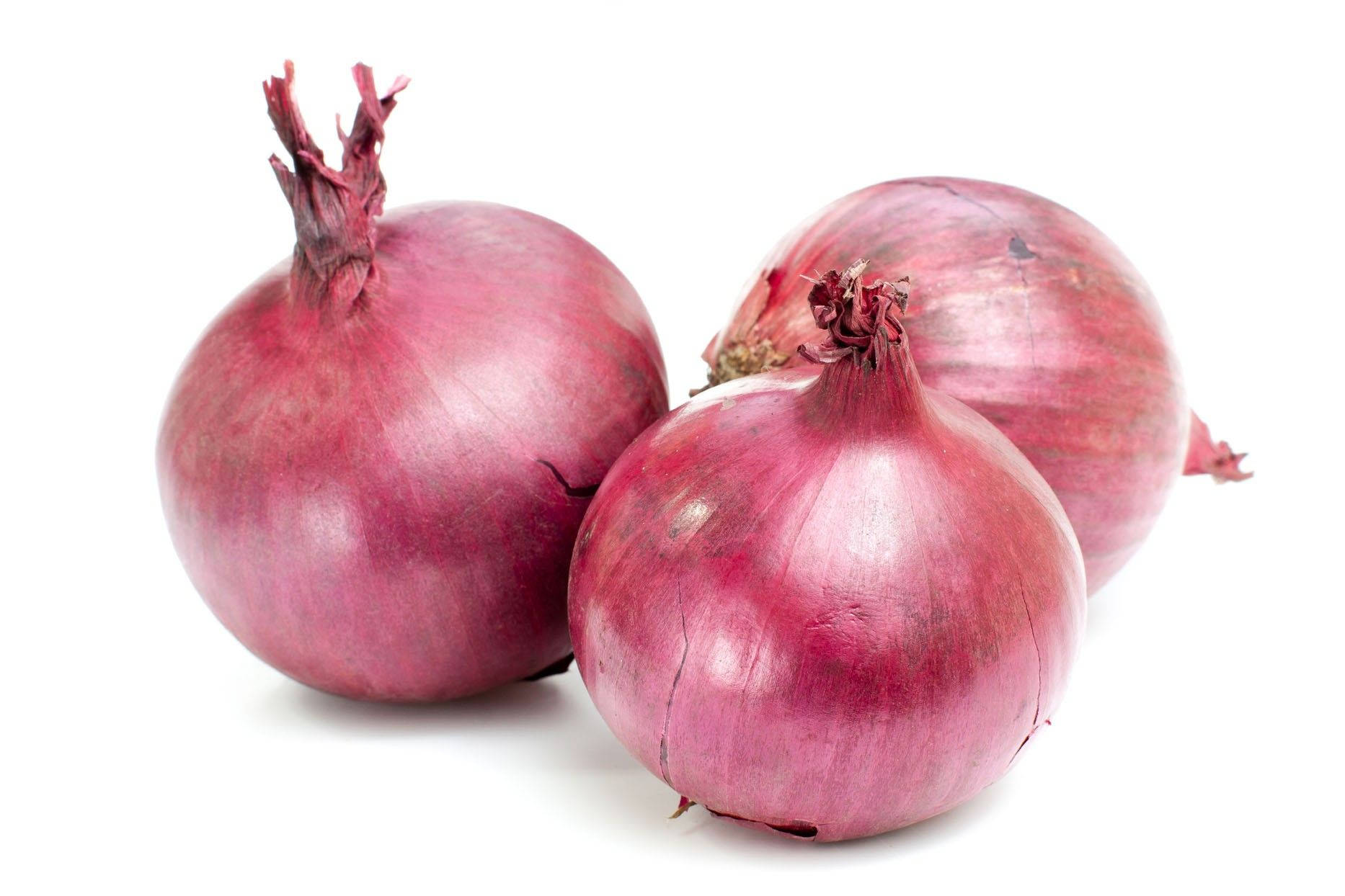 Freshly Harvested Onions Glossy Skins Background