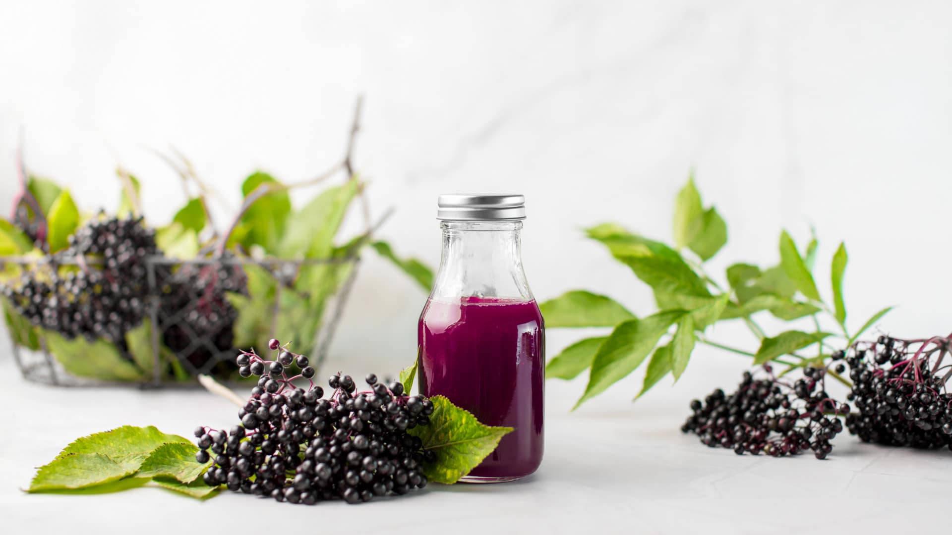 Freshly Picked Elderberry And Juice Background