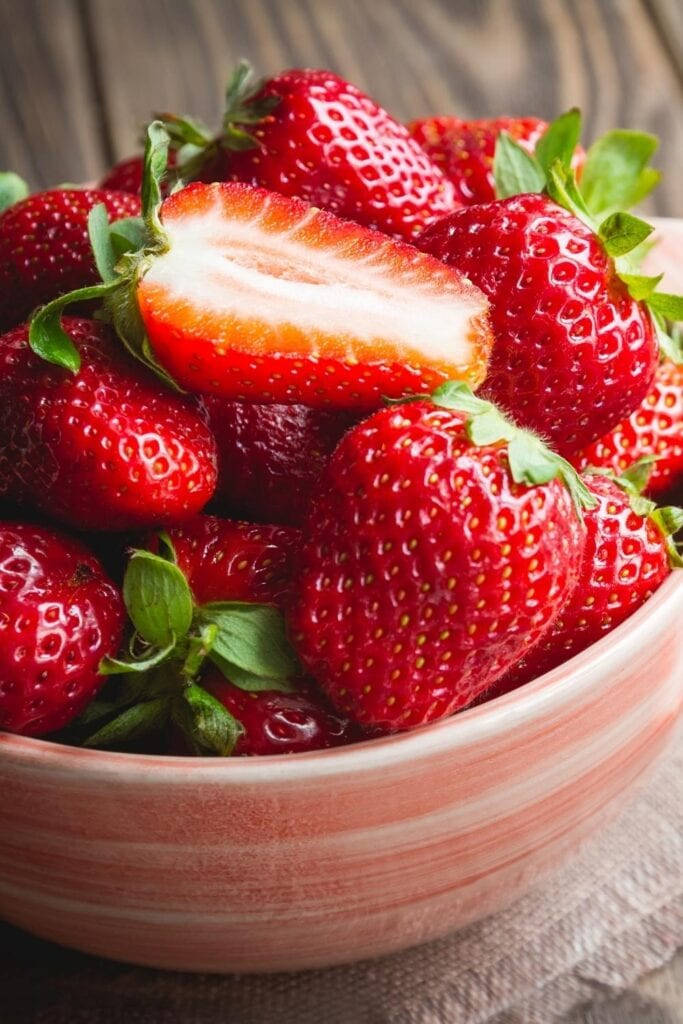 Freshly Picked Strawberries In Pink Bowl