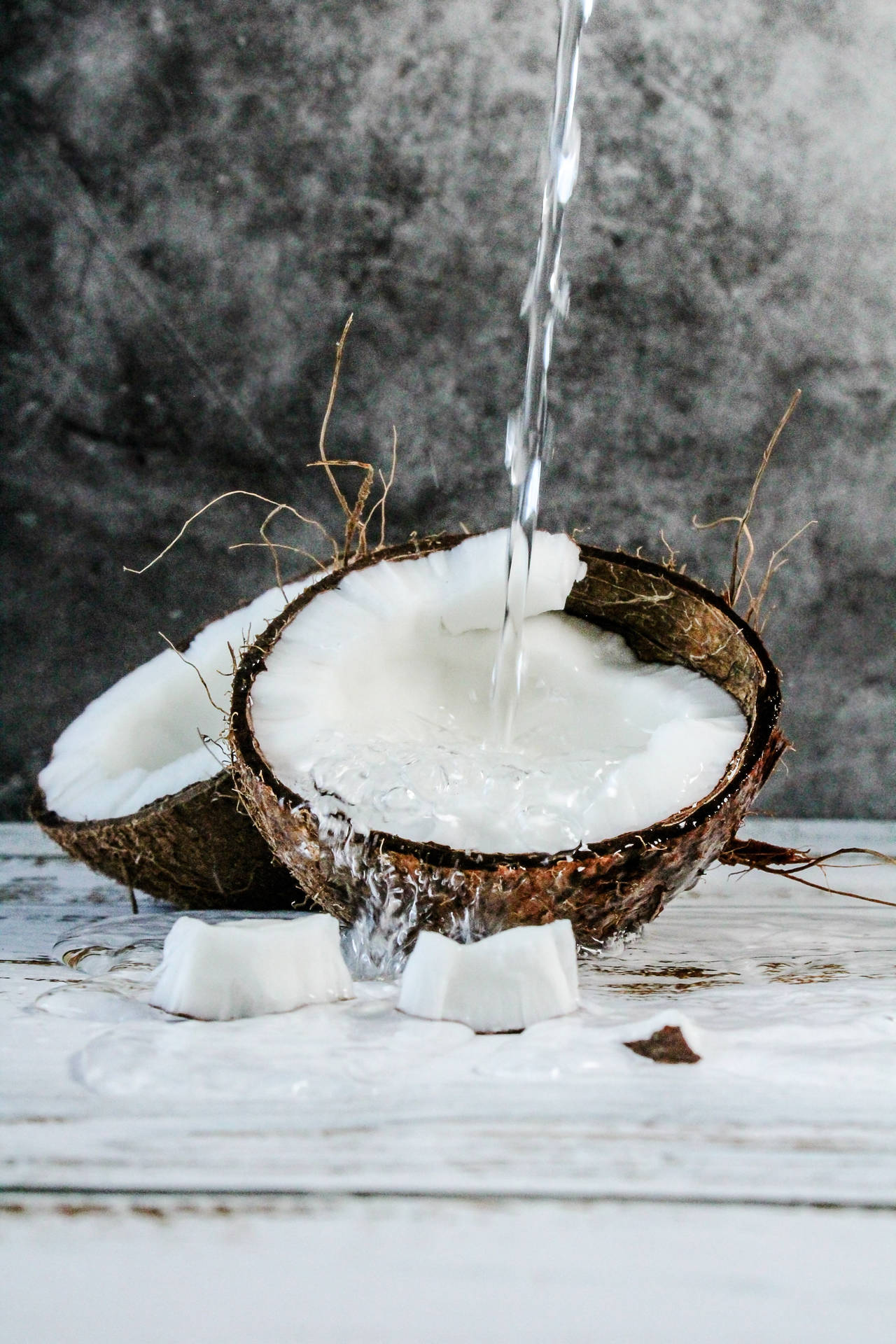 Freshly Poured Coconut Water Background