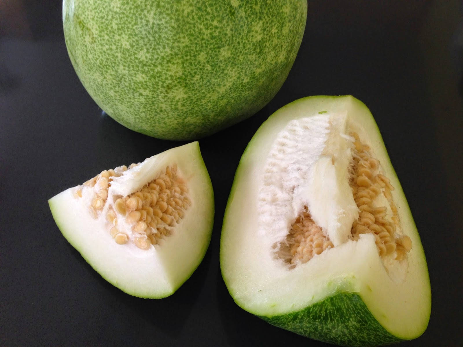 Freshly Sliced Ash Gourd Vegetable Background