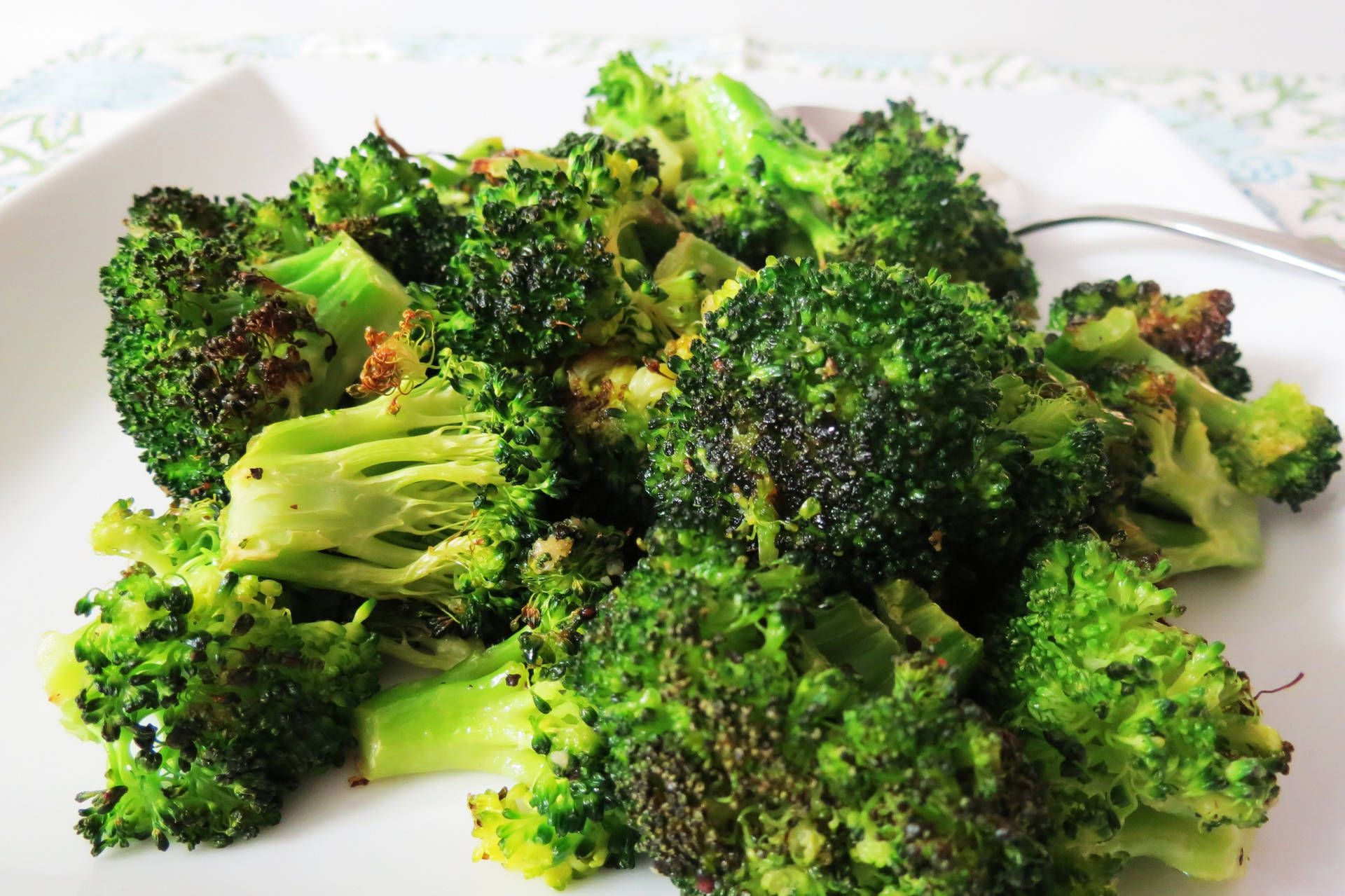 Fried Broccoli On Plate Background