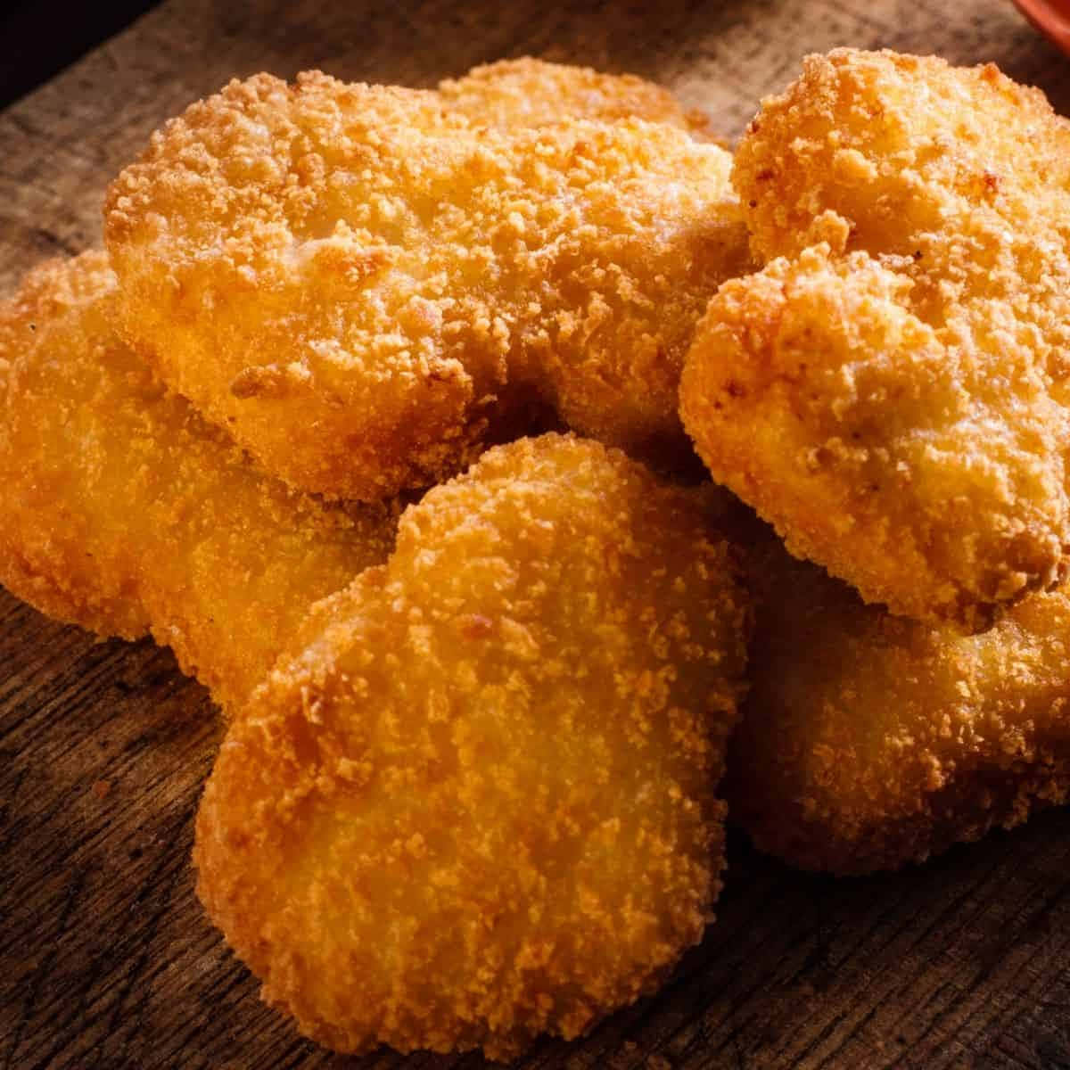 Fried Chicken Nuggets On A Wooden Table