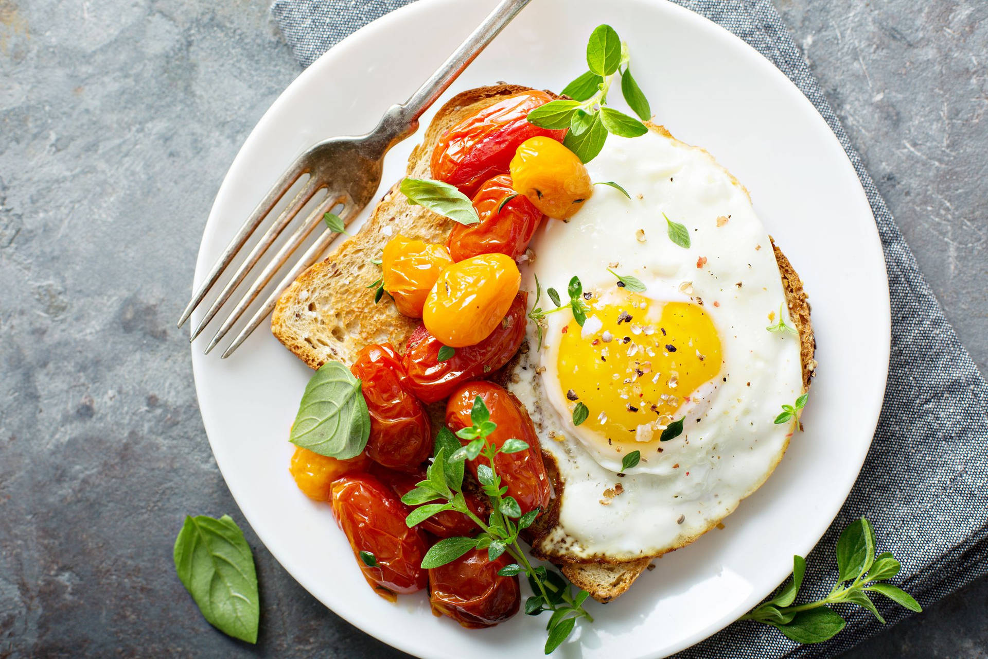 Fried Egg With A Side Of Cherry Tomato Background