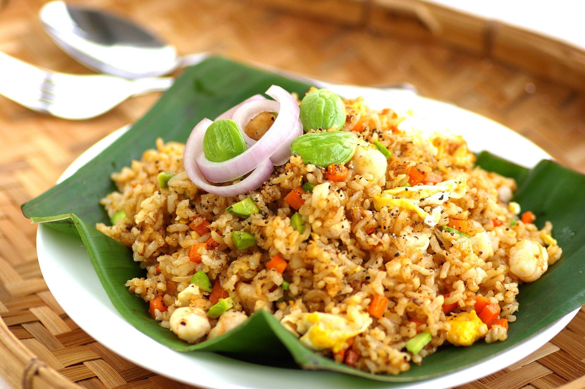 Fried Rice On A Banana Leaf Background