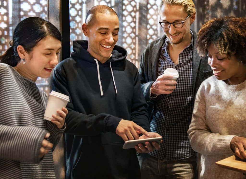 Friends Sharing Laugh Over Phone Background