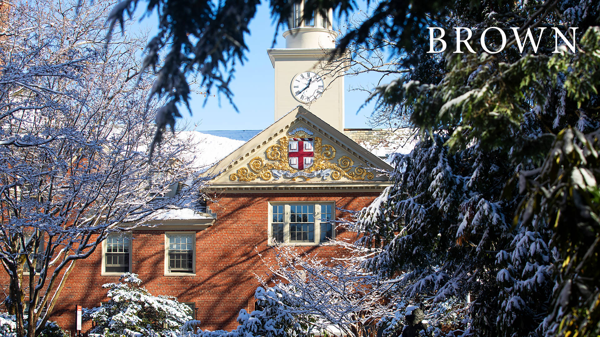 Front Photo Of Brown University Building With Snow Background