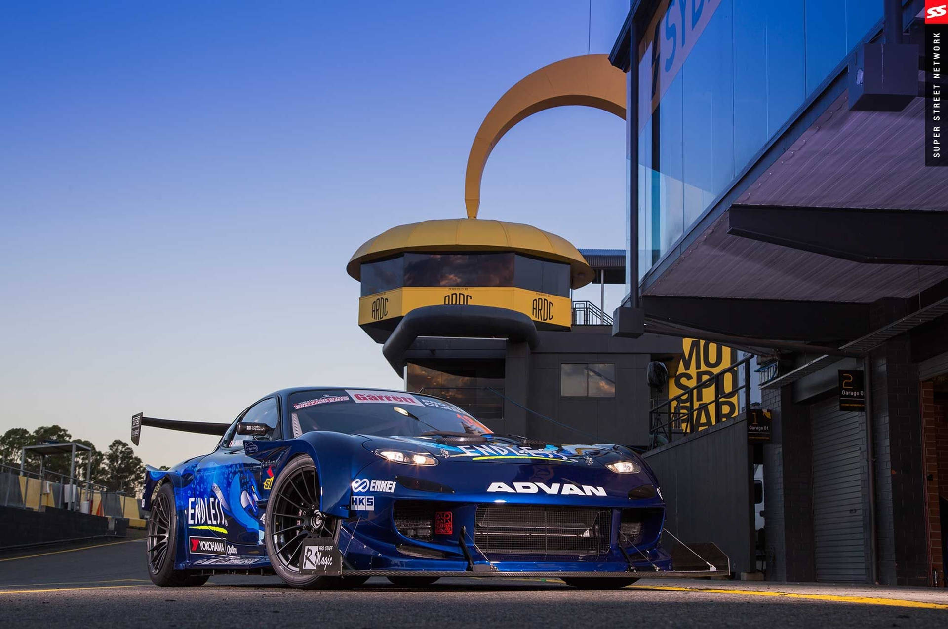 Front View Blue Rx7 Car Background