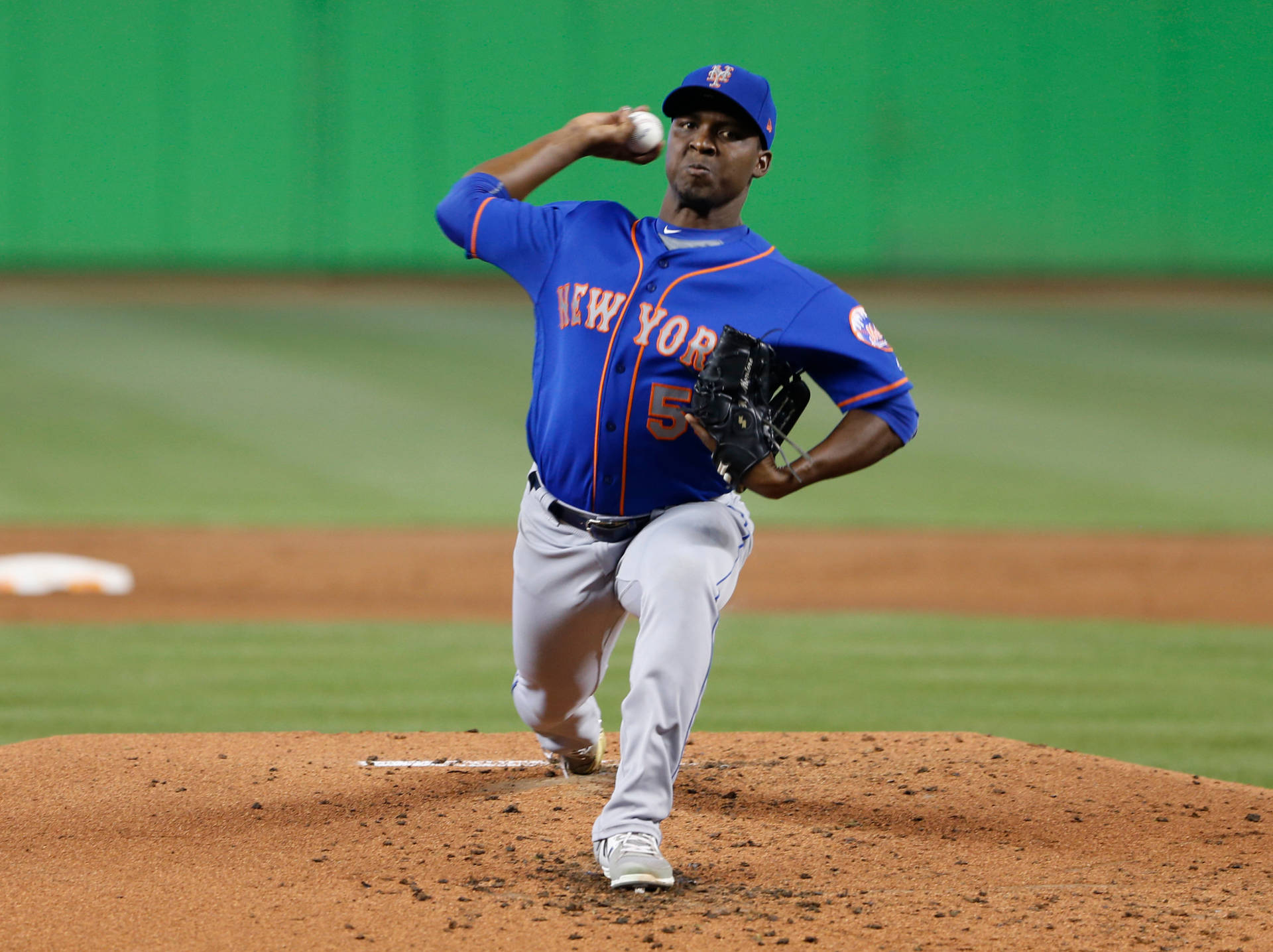 Front View Of Rafael Montero Pitching Background