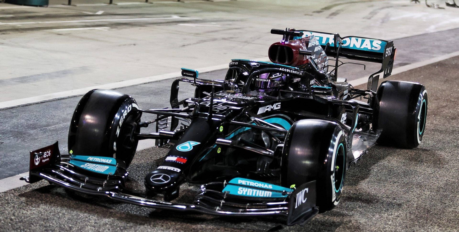 Front View Of The Mercedes Of Lewis Hamilton F1 Background