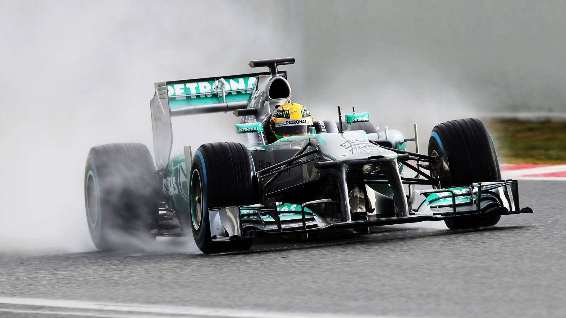 Front View Of The Mercedes Racing Car Of Hamilton F1 Background