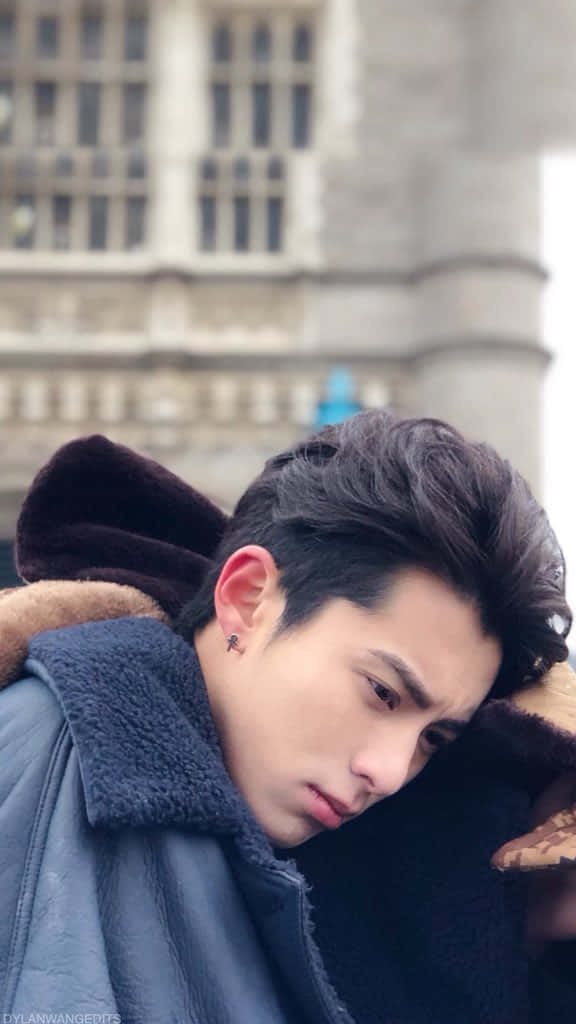 Frowning Dylan Wang Background