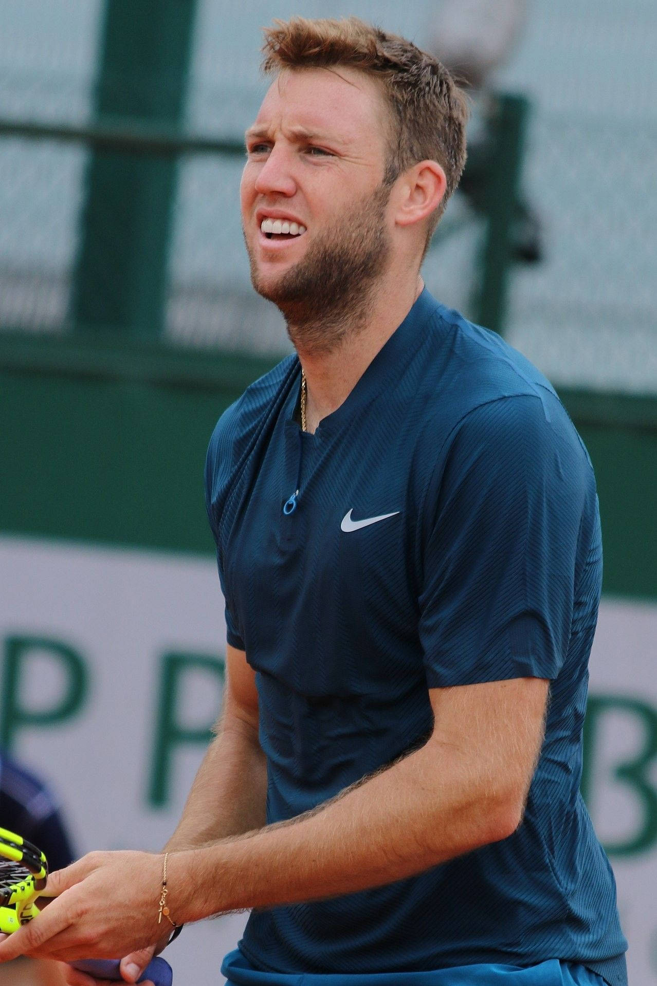 Frowning Jack Sock Background