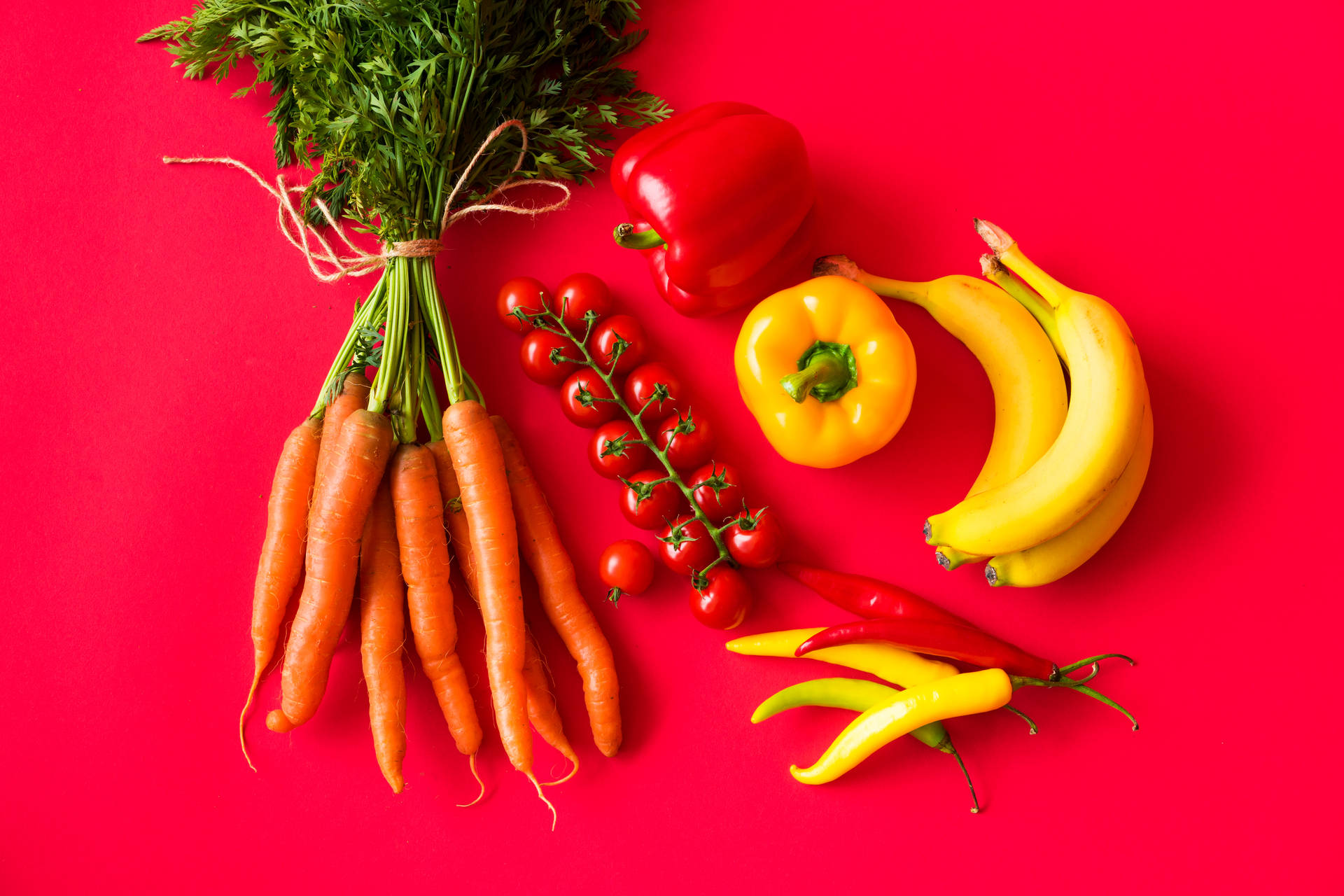 Fruits And Veggies With Red Color Background