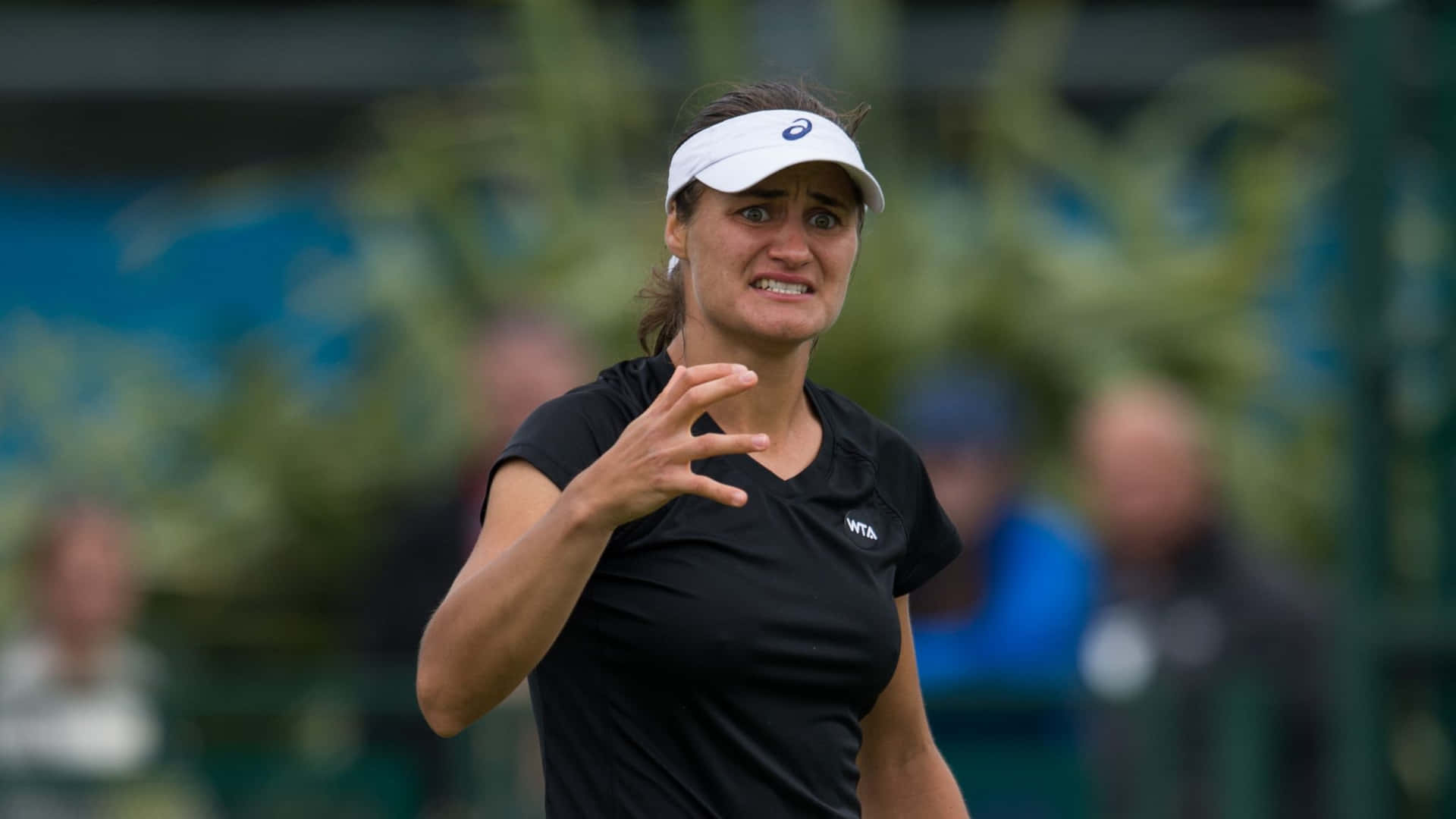 Frustrated Monica Niculescu Wearing Black Background