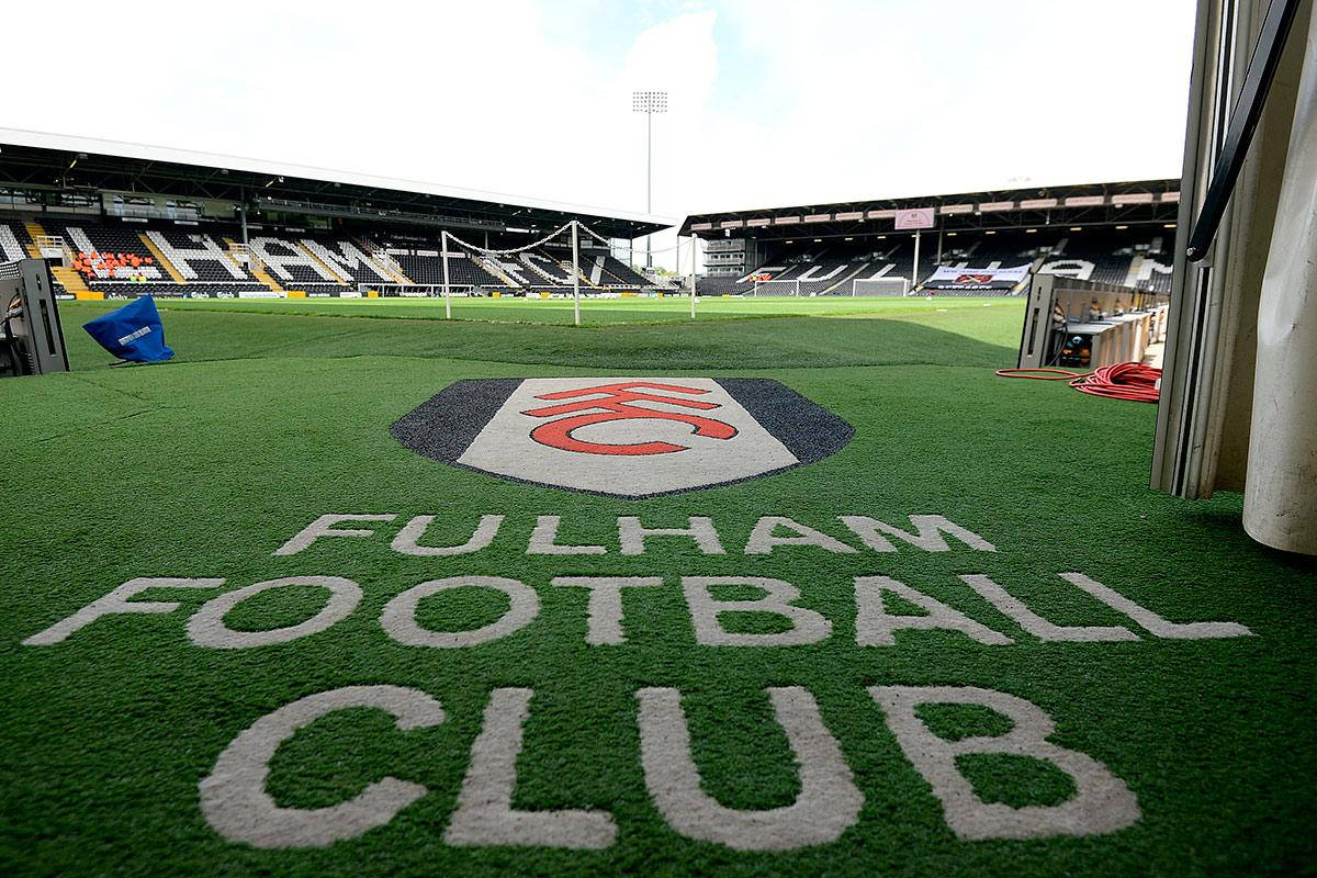 Fulham Fc Name Crest Grass Background