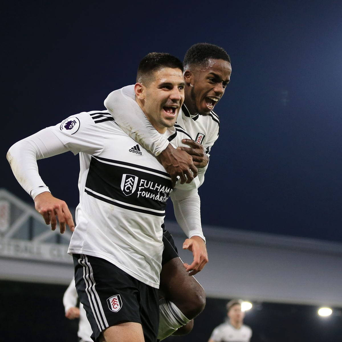 Fulham Fc Player Carrying Background