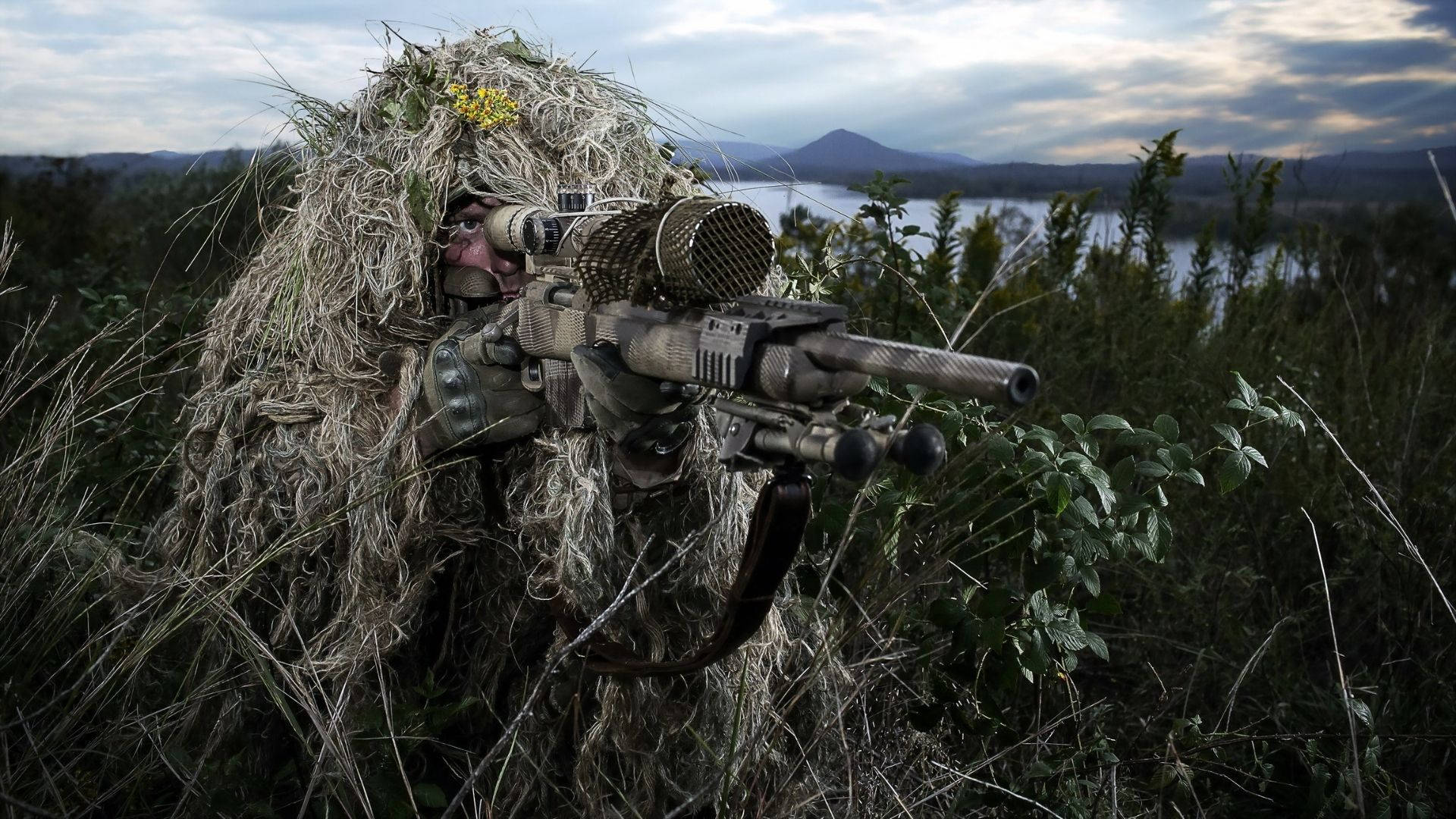 Full Camo Soldier Holding A Sniper Background