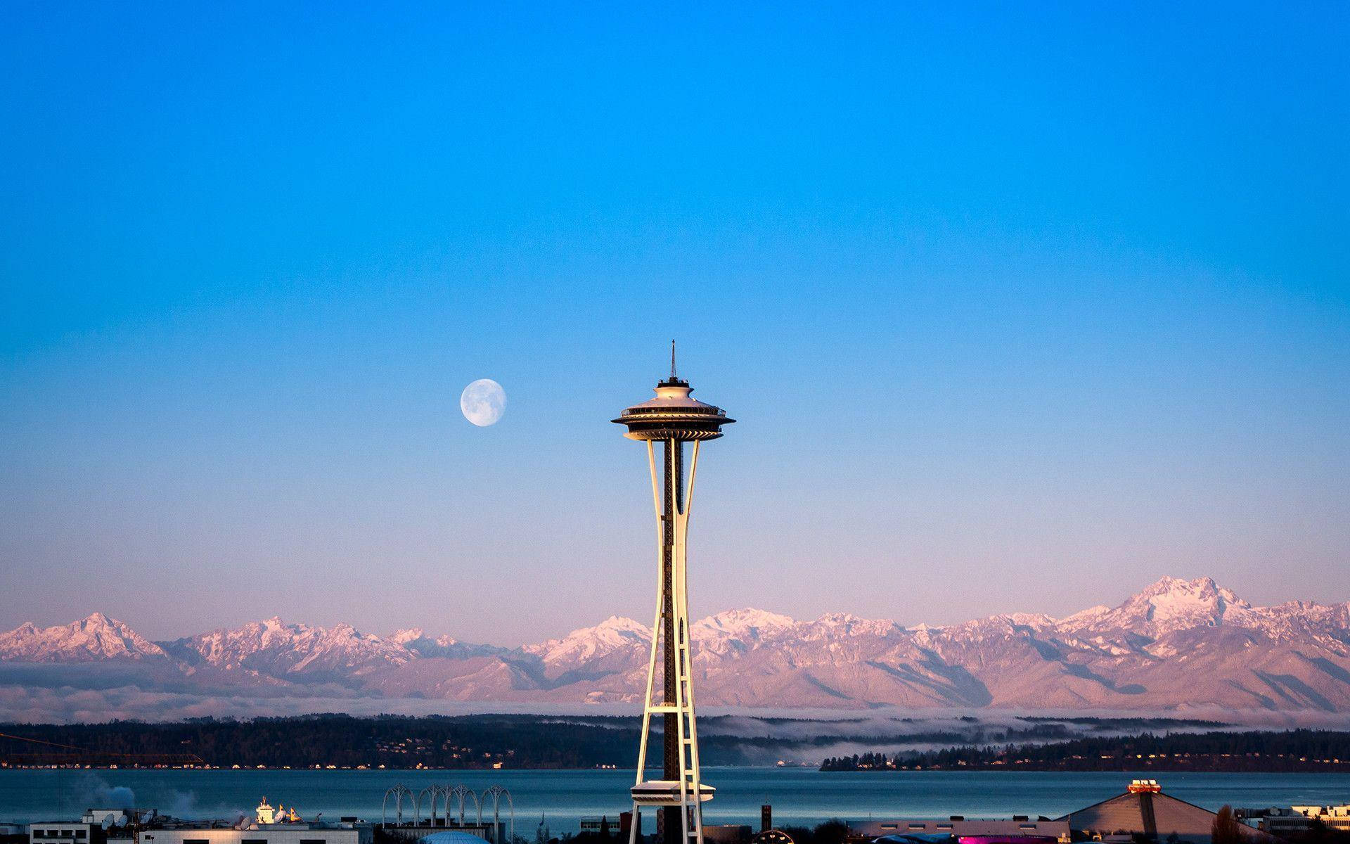 Full Moon Behind Space Needle Background