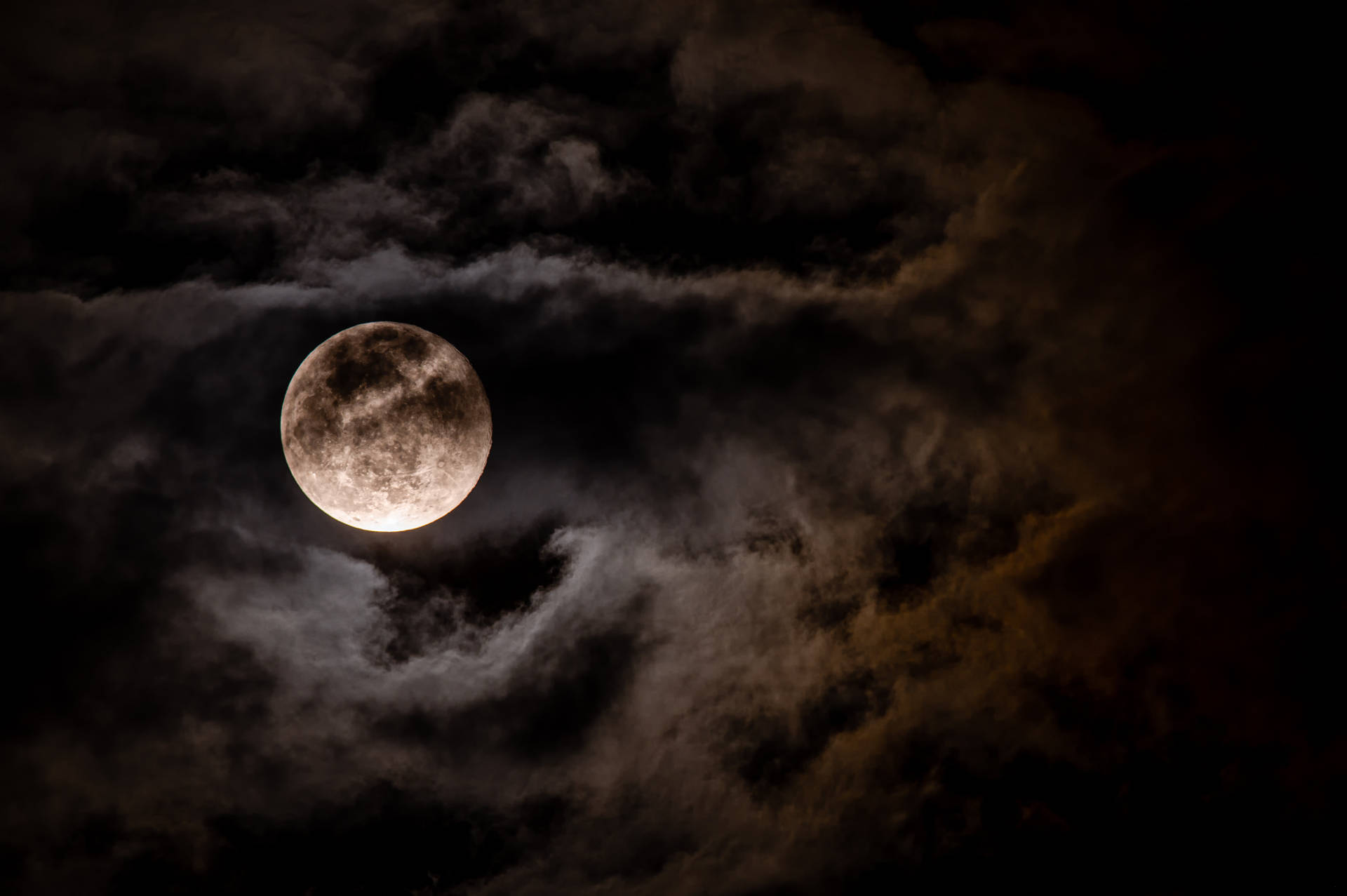 Full Moon In Dark Cloudy Sky Background