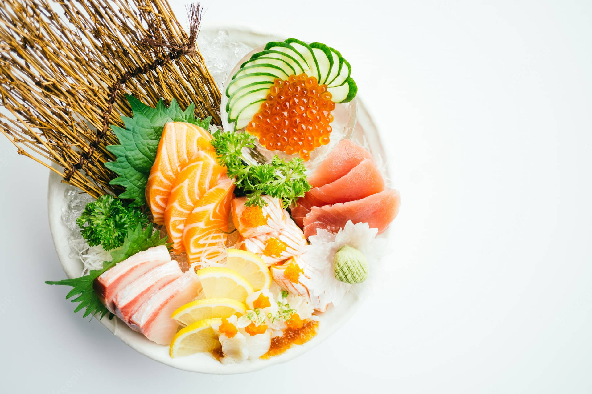 Full Sashimi Bowl With Fish Eggs And Lemon Background