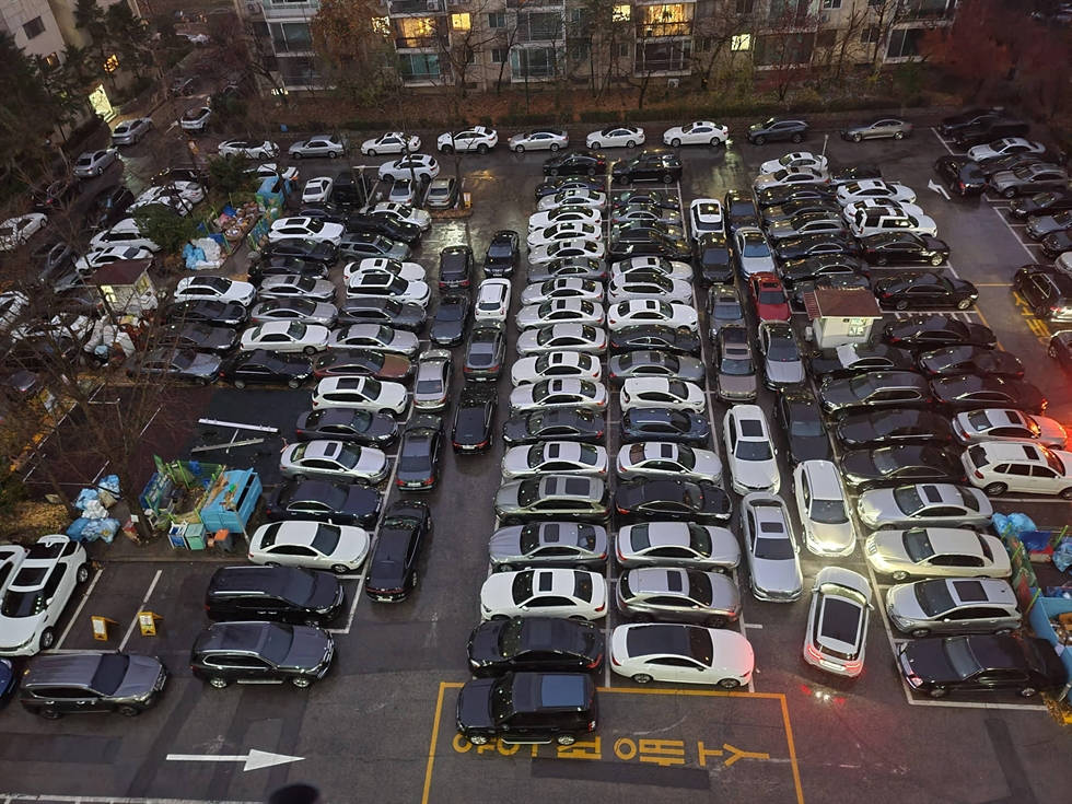 Fully-occupied Parking Lot In Korea Background