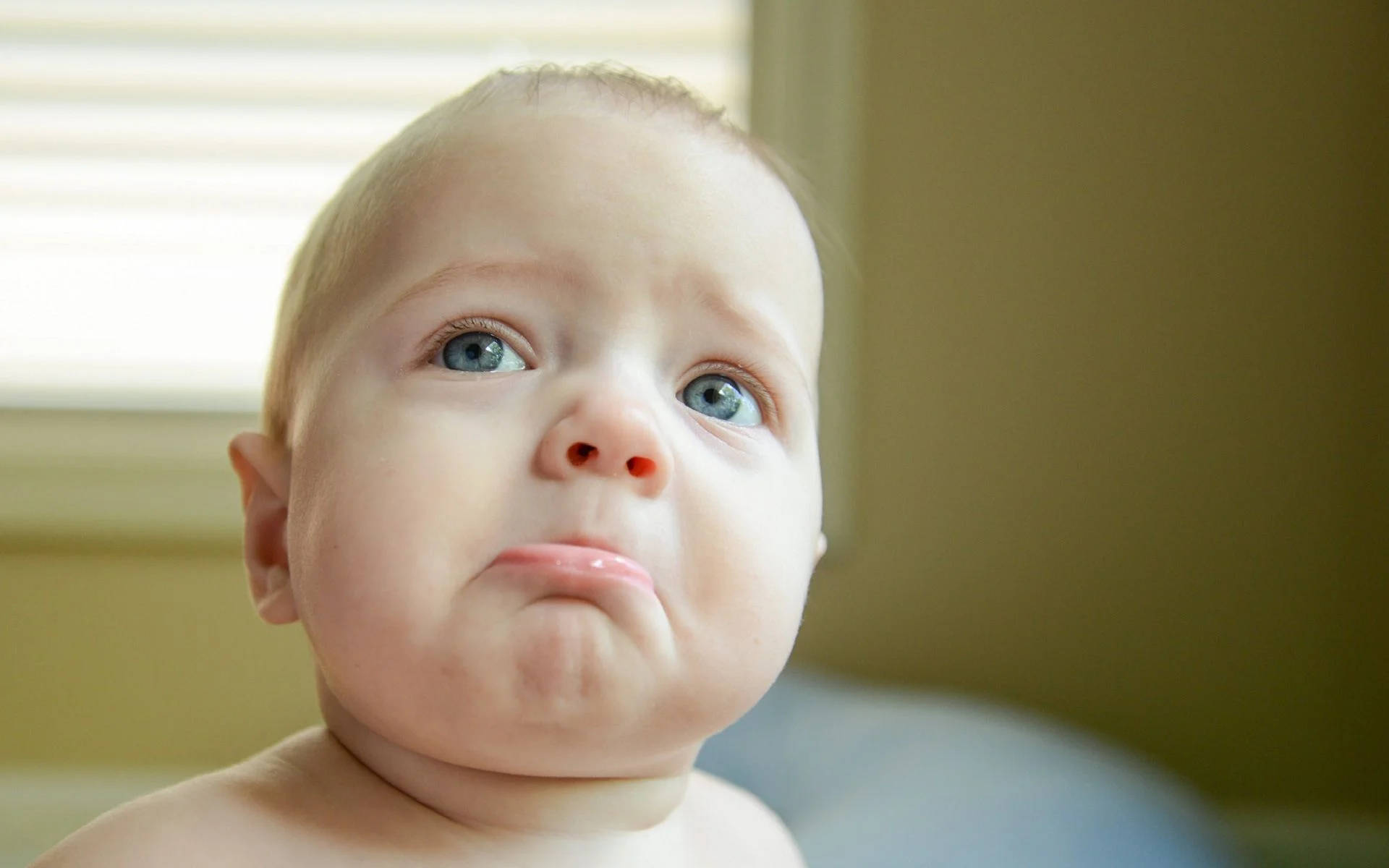 Funny Baby Sad Face Background