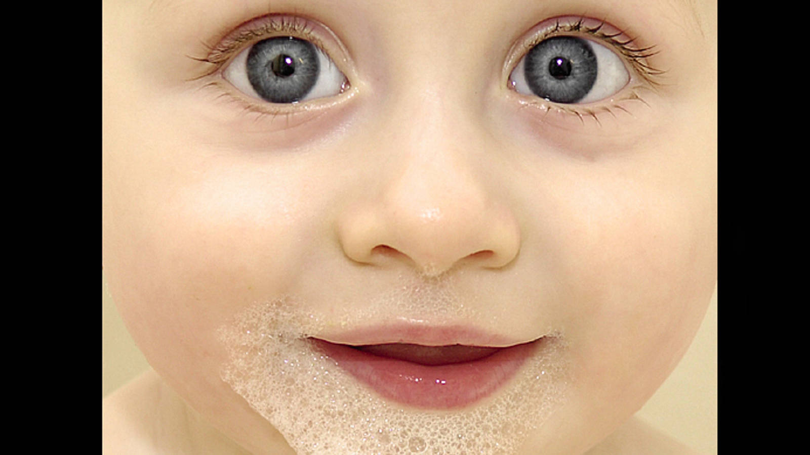 Funny Baby With Big Eyes Background