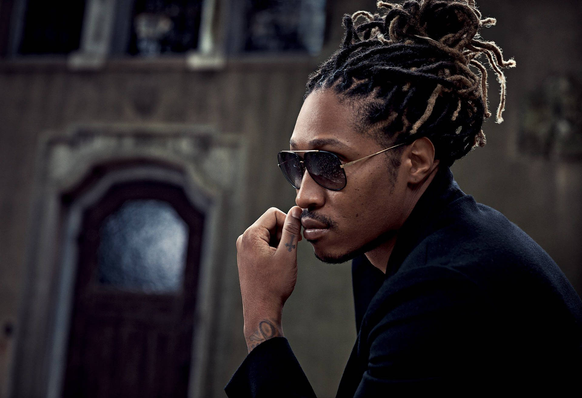 Future Rapper Sitting Sideview Background