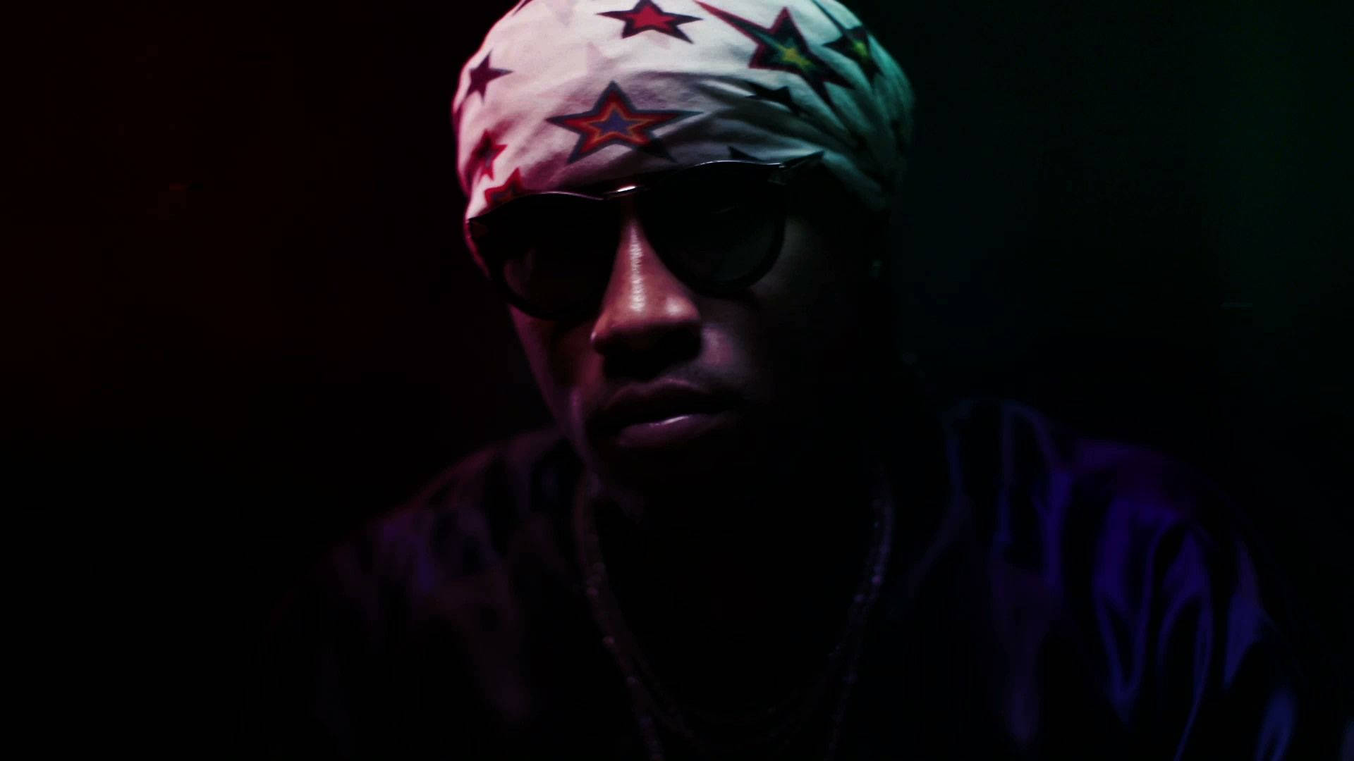 Future Rapper With Stars-themed Durag Background