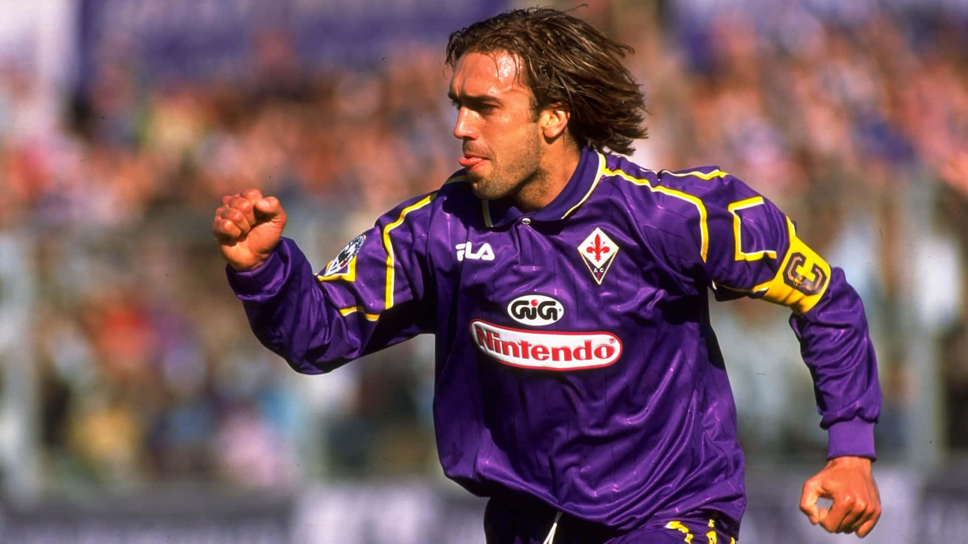 Gabriel Batistuta Expressing Emotion On The Field Background