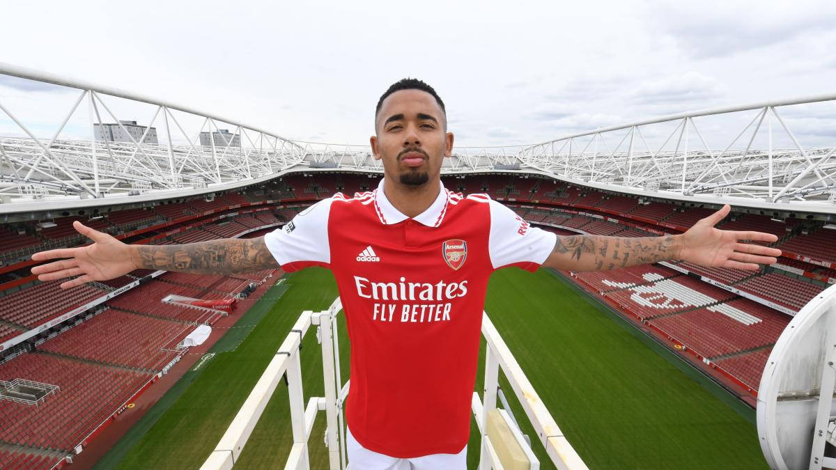 Gabriel Jesus Arms Out By Stadium Background