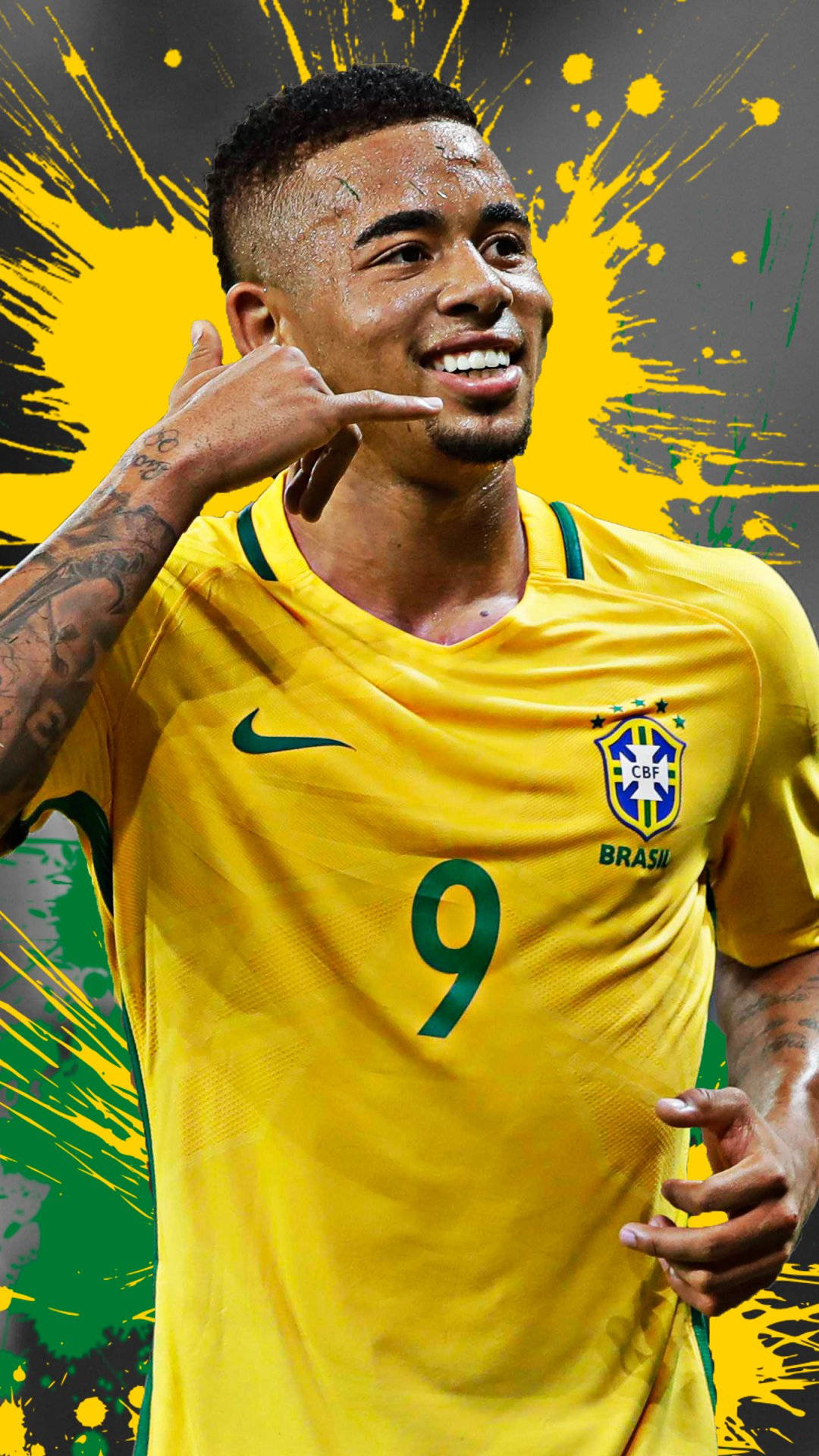 Gabriel Jesus In Yellow Phone Gesture Background