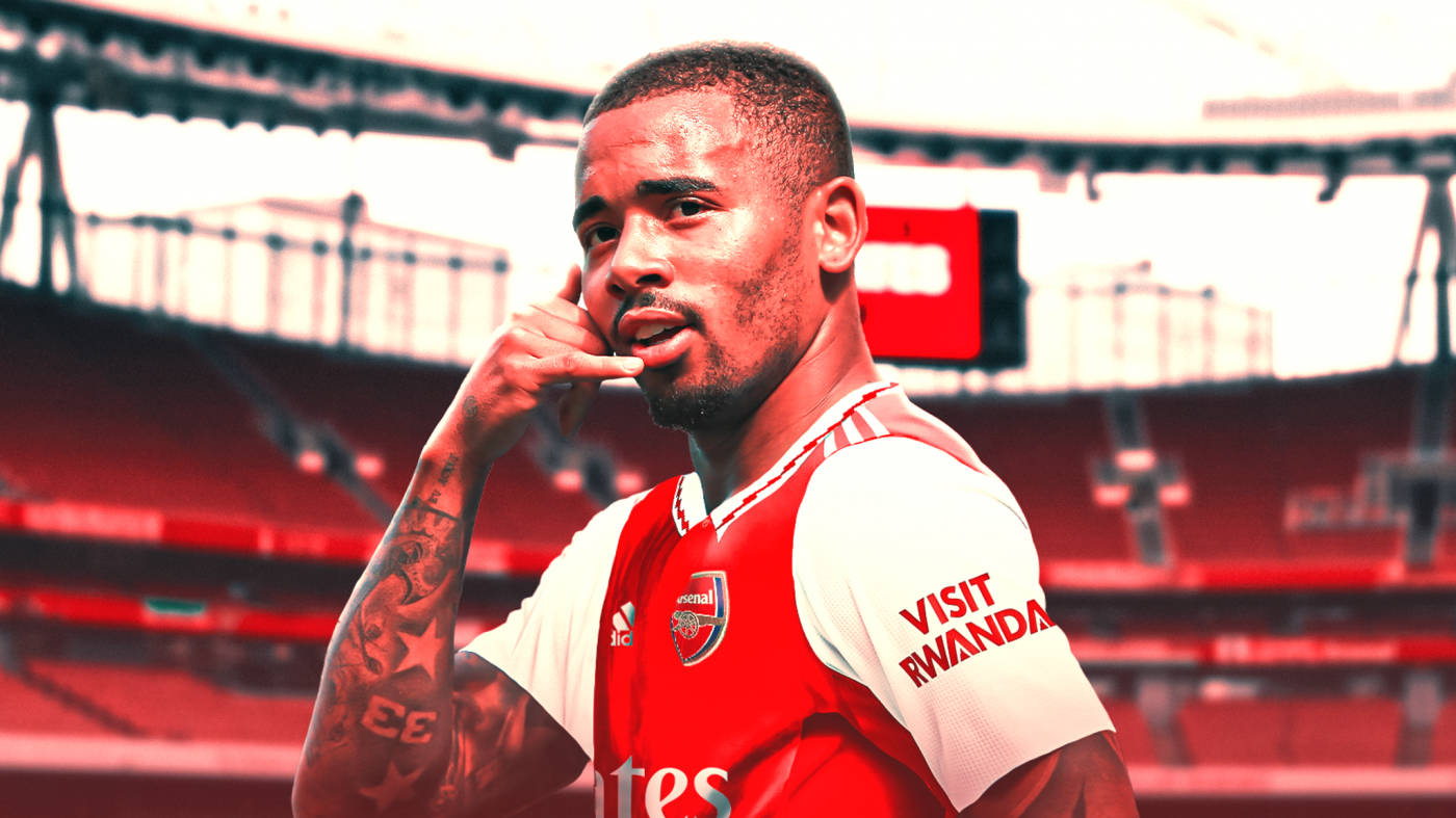 Gabriel Jesus Phone Gesture Cheeky Smile Background