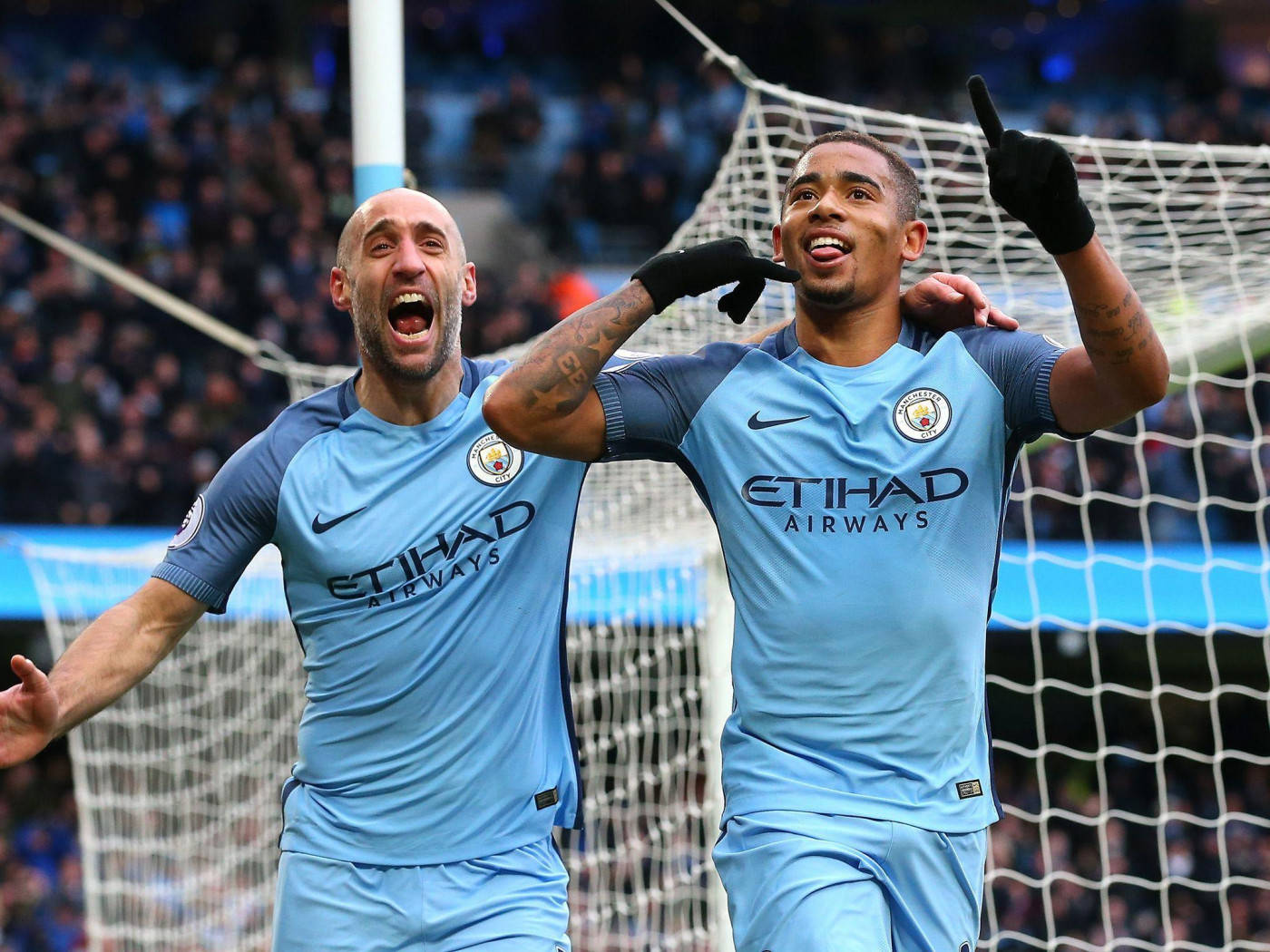 Gabriel Jesus With Another Player Cheering Background