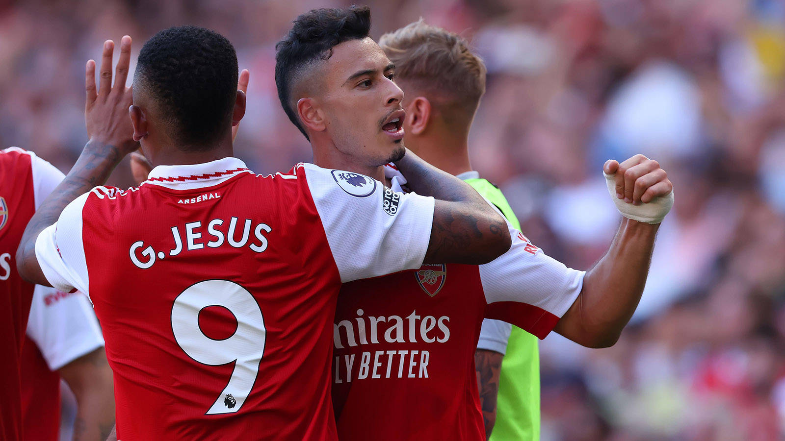 Gabriel Martinelli Hugged By Teammate Background