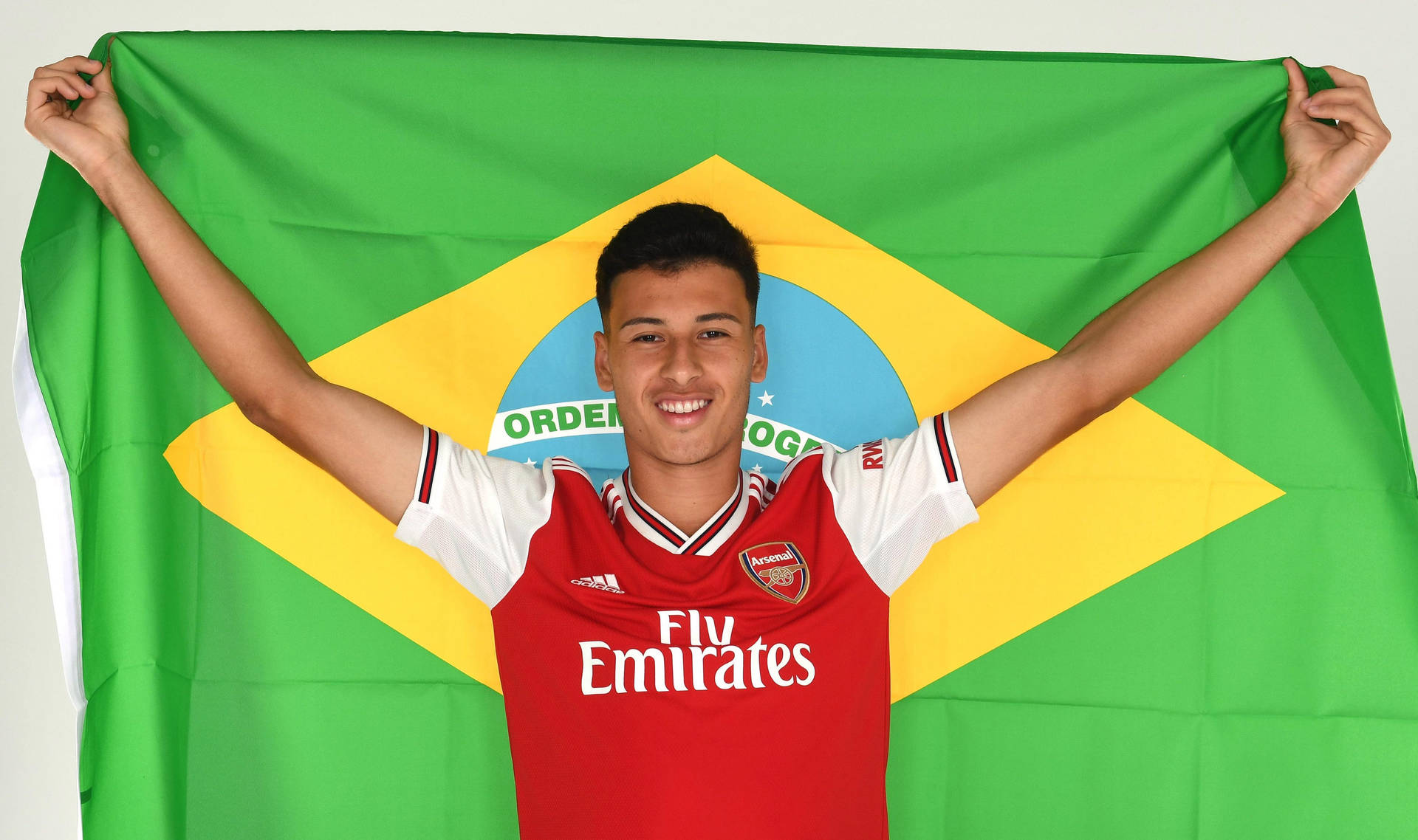 Gabriel Martinelli With Brazil Flag Background