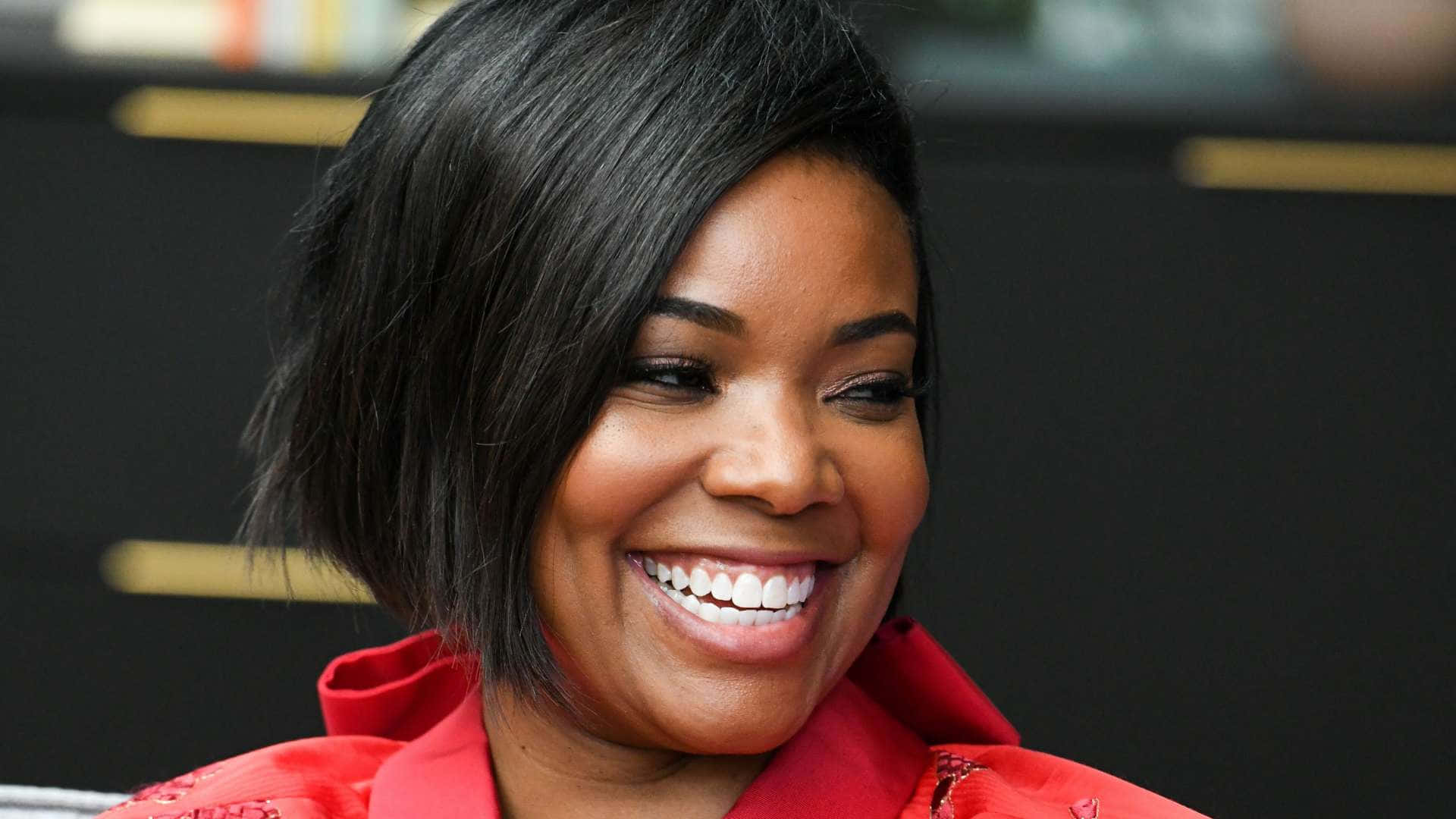 Gabrielle Union Smiling Radiantly In A Stunning Photoshoot Background