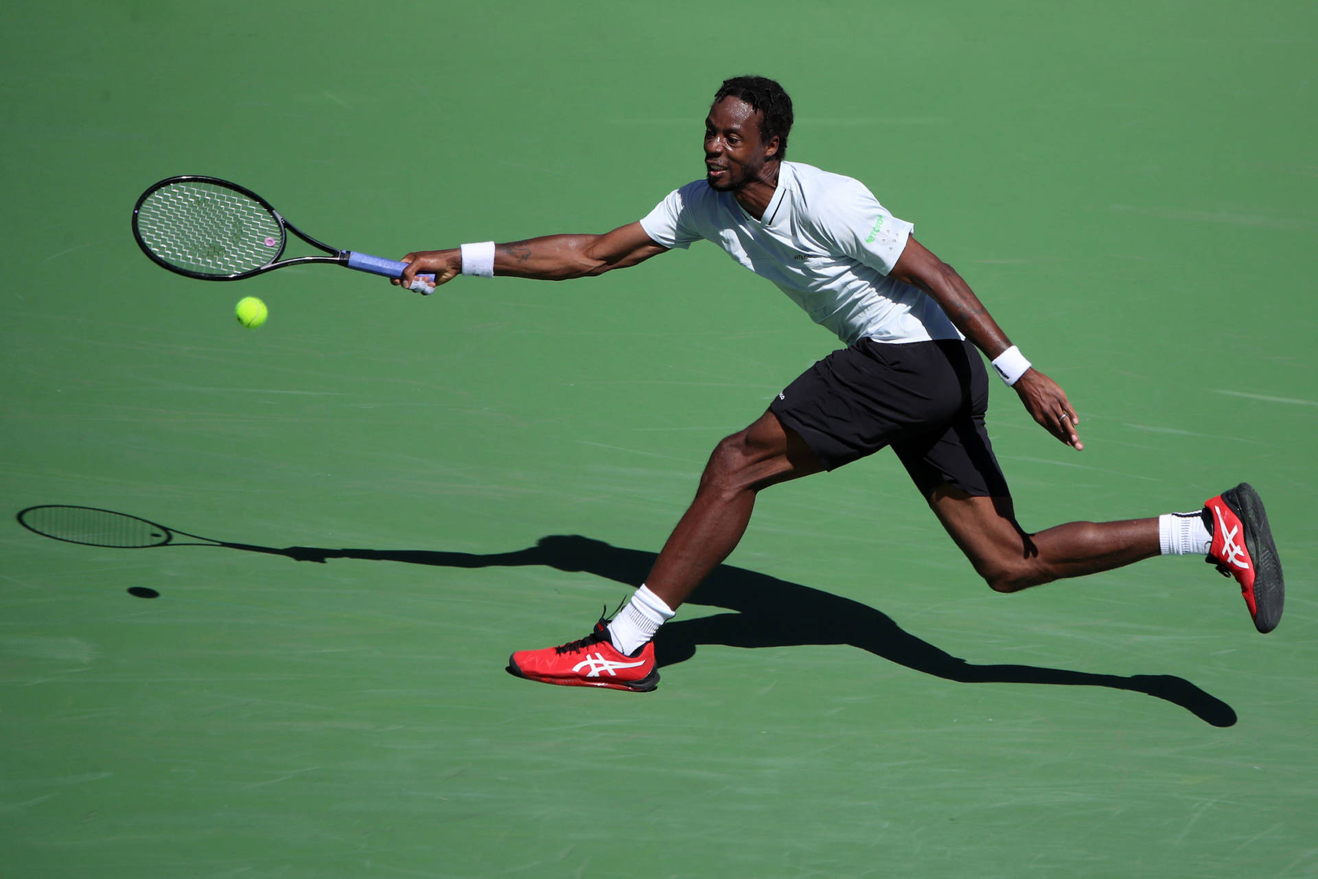 Gael Monfils In Action - An Extraordinary Athletic Performance Background