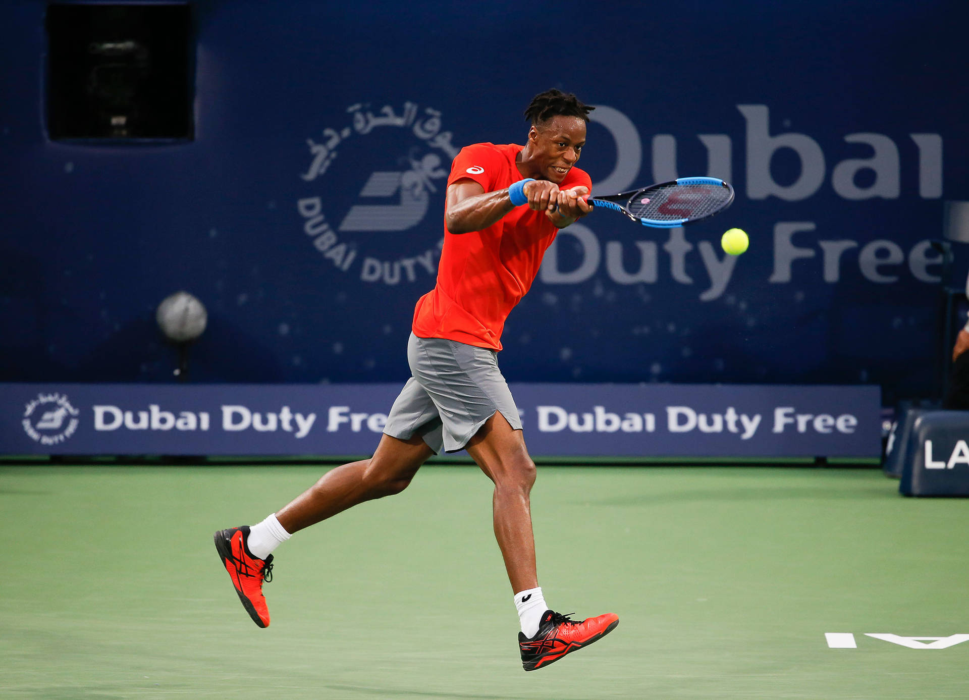 Gael Monfils In Red Shirt Background