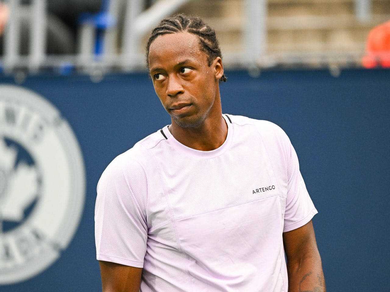 Gael Monfils In White Shirt Background