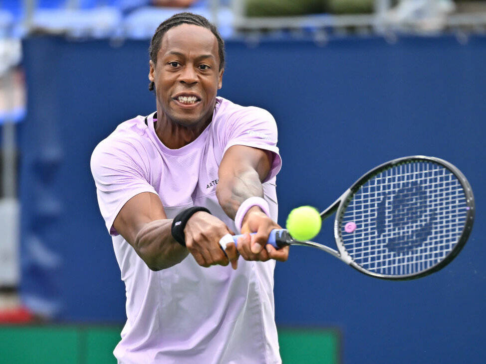 Gael Monfils Wearing Pastel Lavender Shirt Background