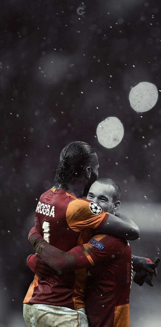 Galatasaray Players Hugging Background