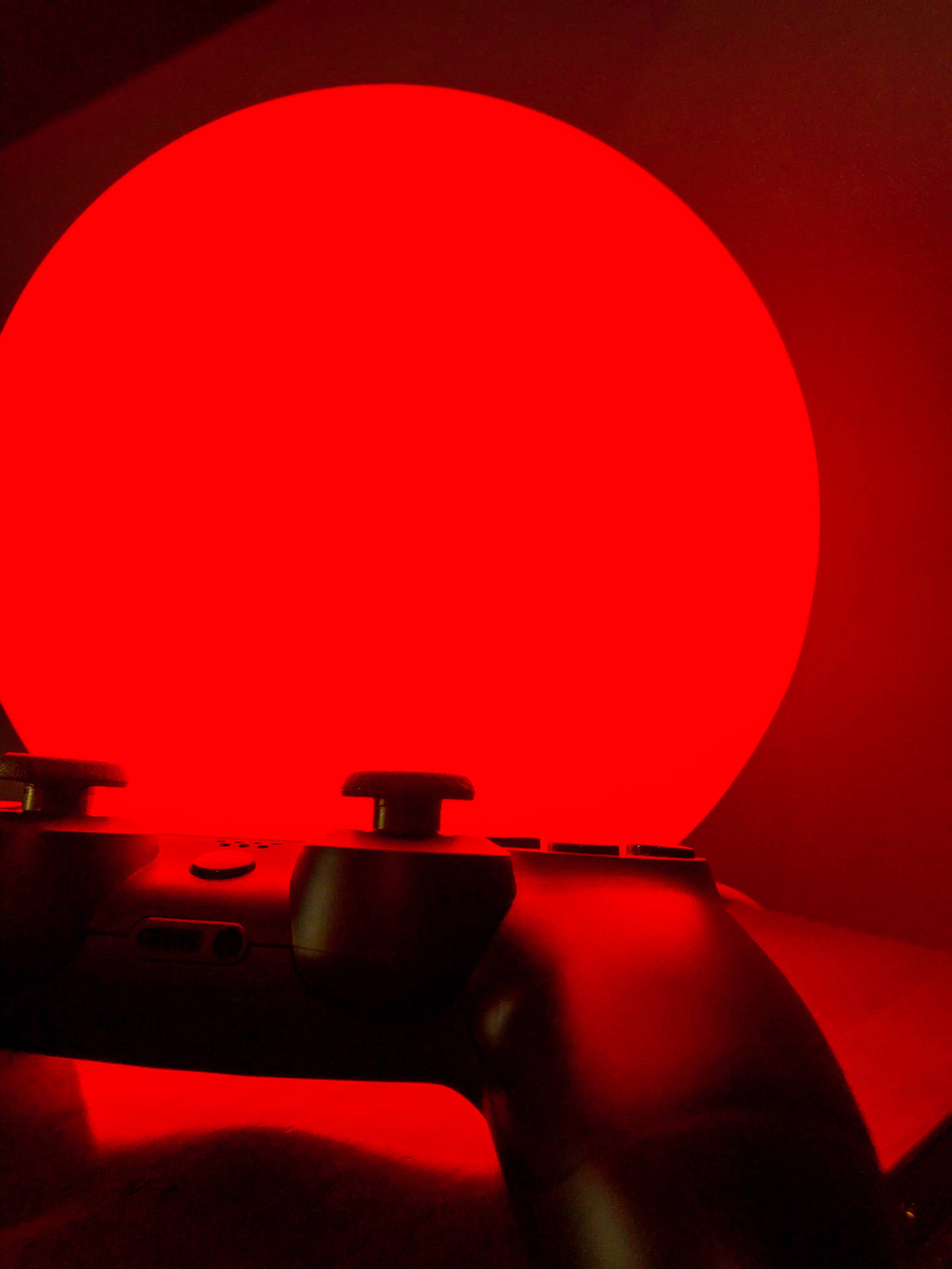 Game On With This Vivid Red Wireless Controller Background