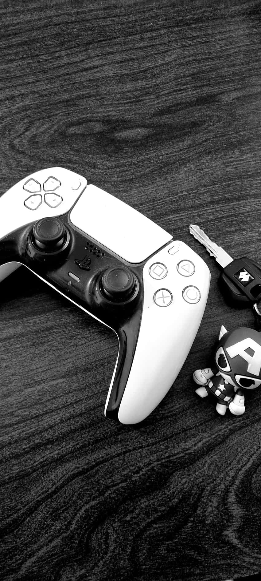 Game Peripheral And Captain America Keychain Background